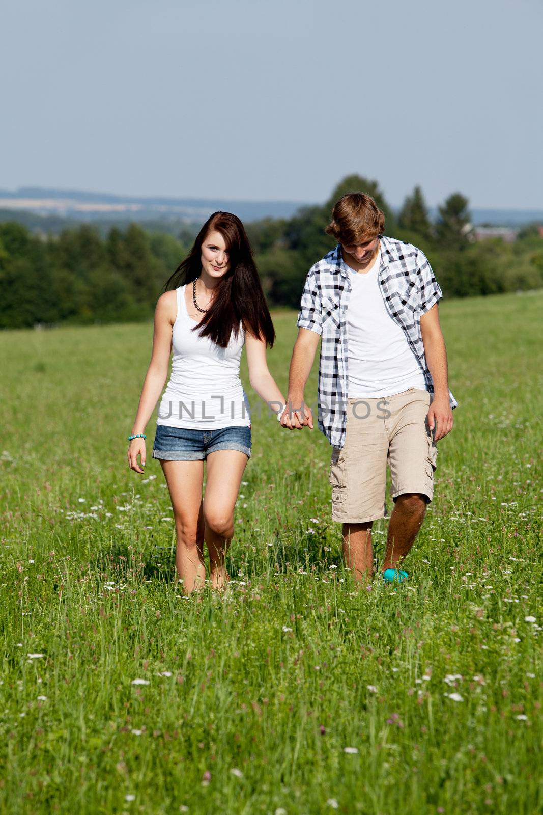 young love couple smiling outdoor in summer having fun