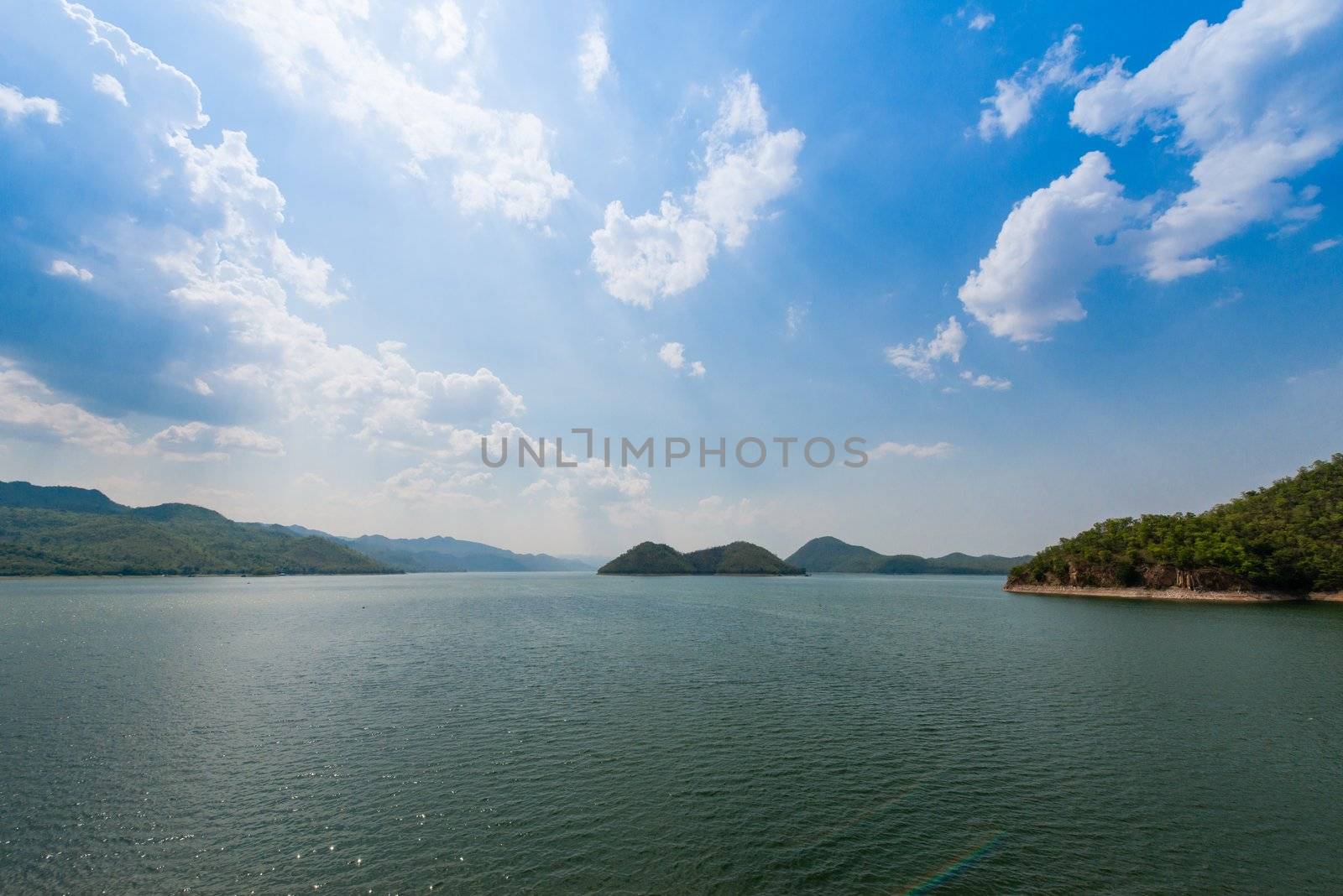 A man made lake as a result of a dam setting up in Thailand by sasilsolutions