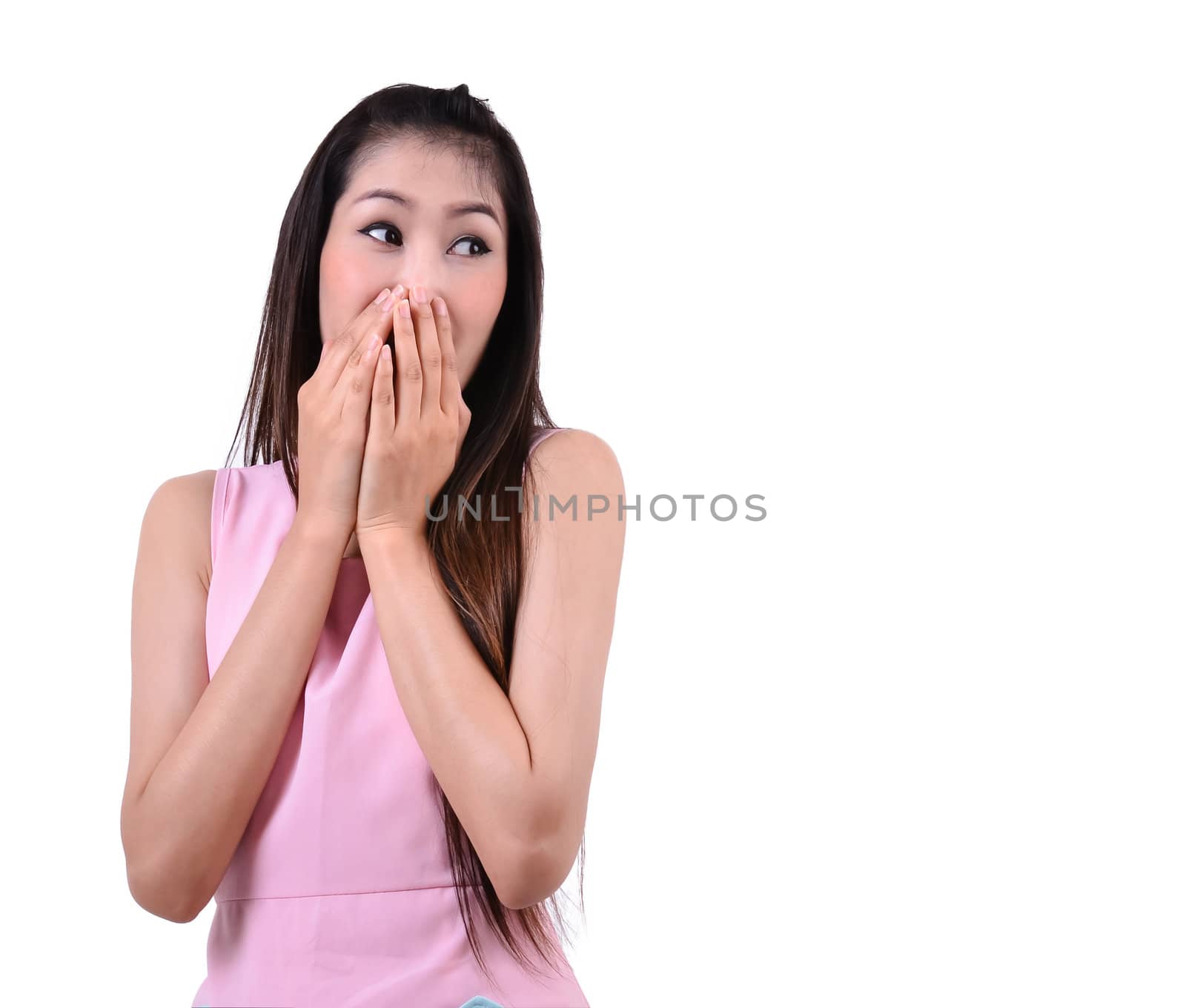 beautiful woman looking surprised against a white background