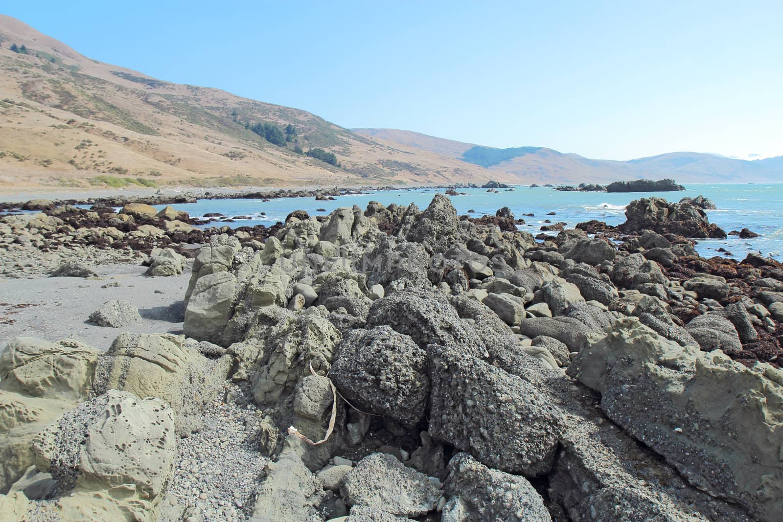 A rocky beach and blue sky off of Mattole Road on the Lost Coast of California