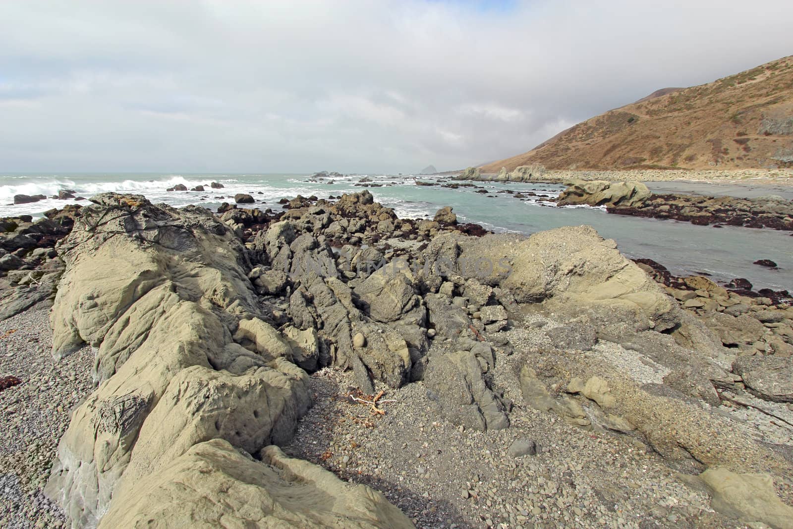 Rocky beach and clouds on the Lost Coast of California by sgoodwin4813