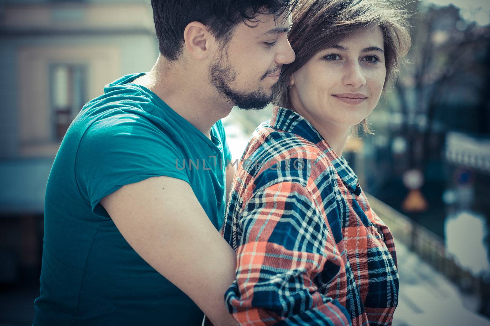 couple embracing on balcony