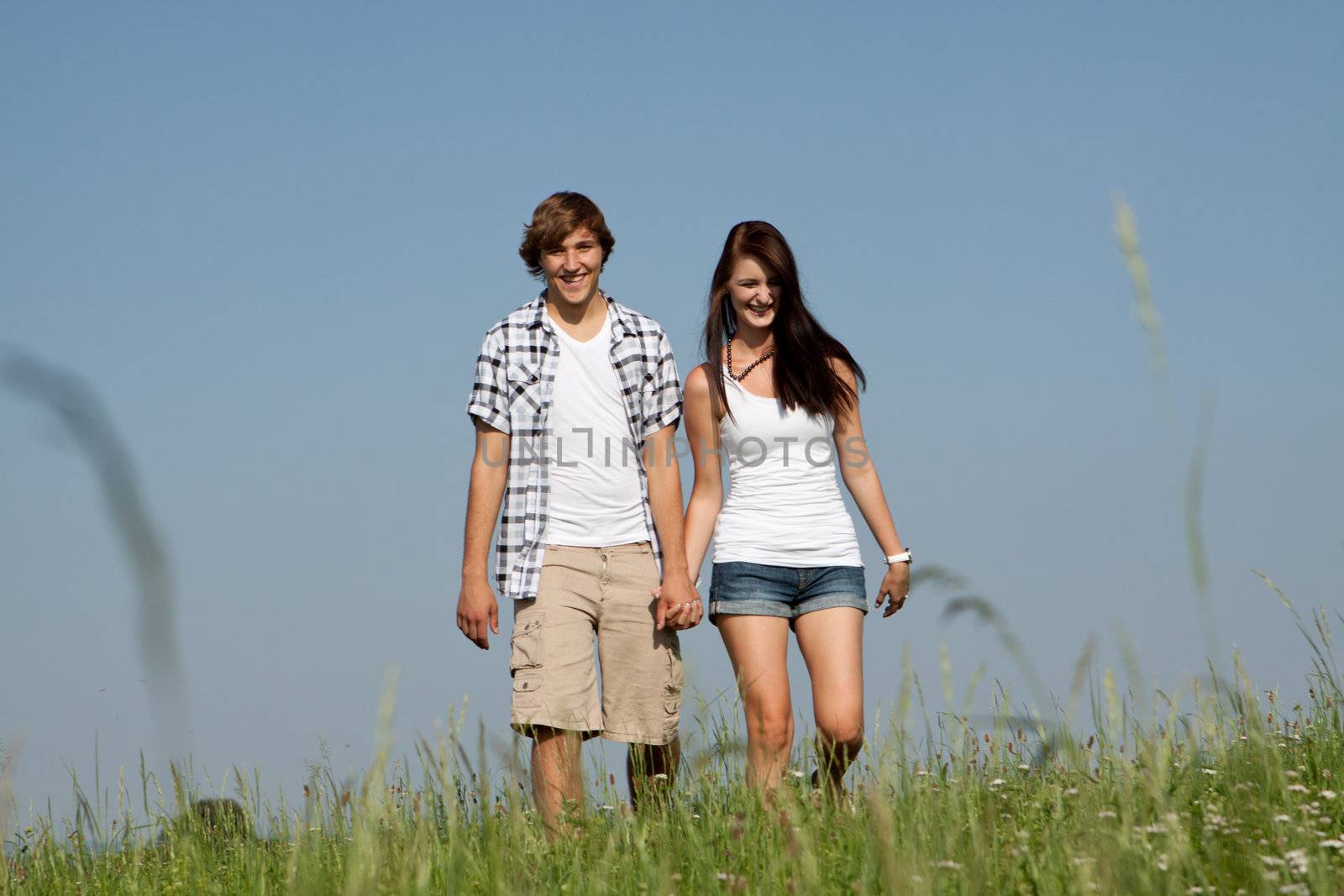 young love couple smiling outdoor in summer  by juniart