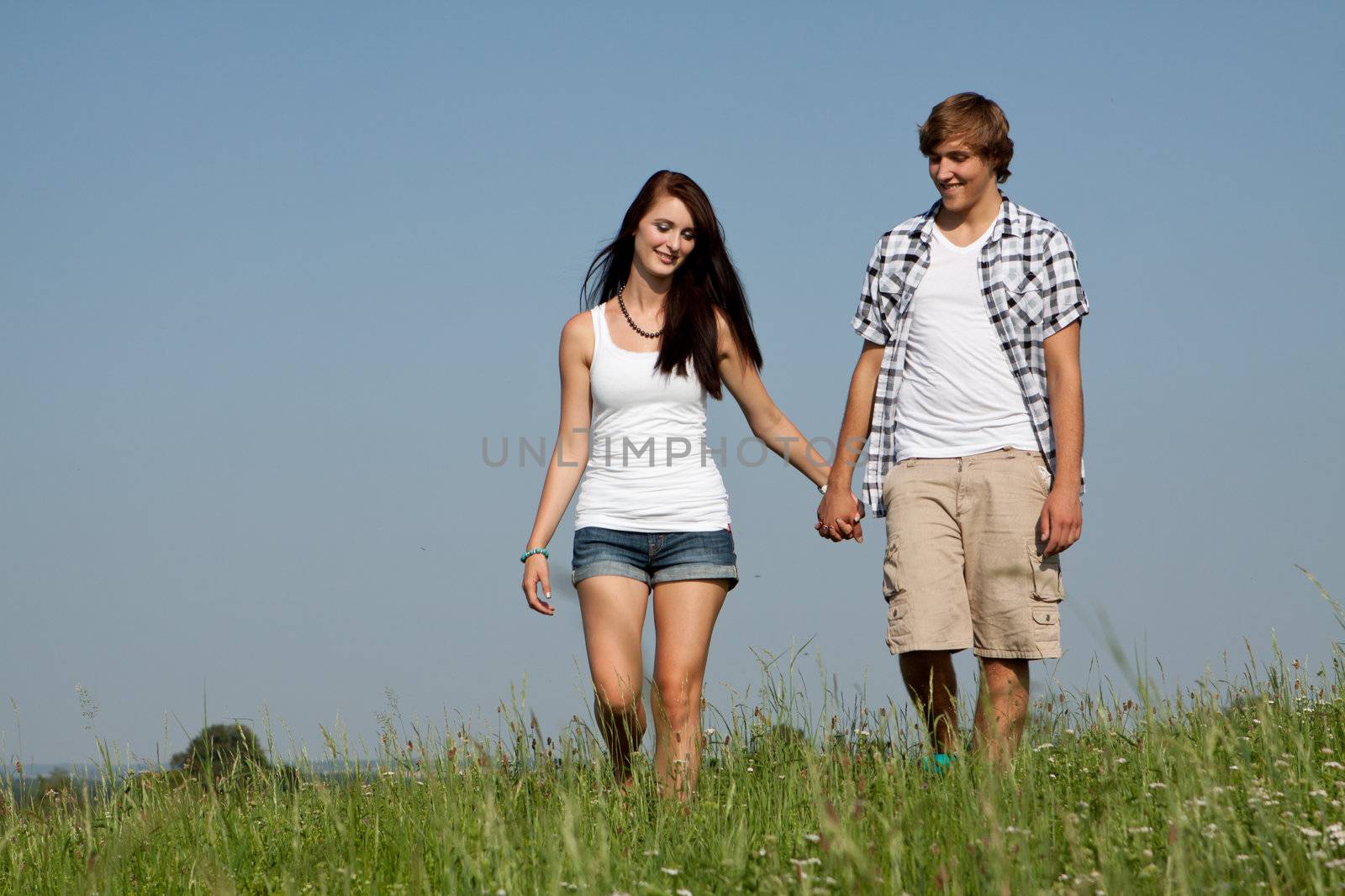 young love couple smiling outdoor in summer having fun