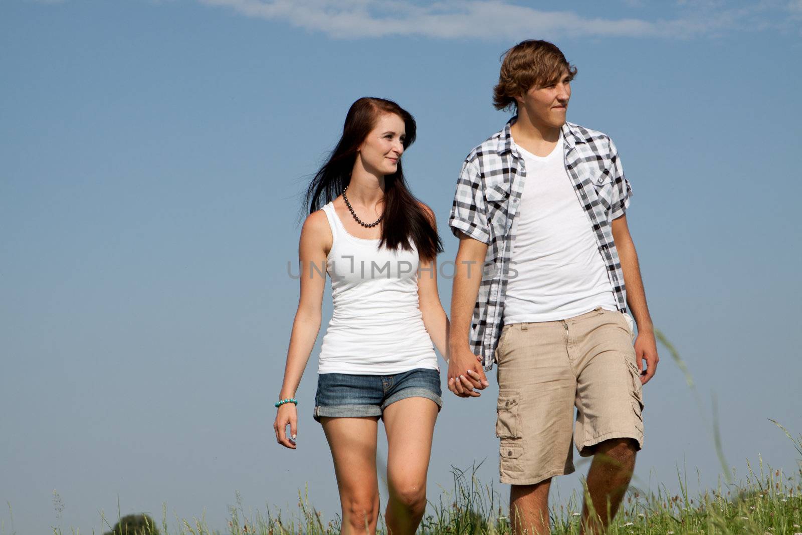 young love couple smiling outdoor in summer having fun