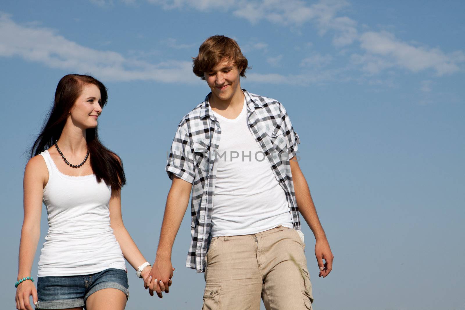 young love couple smiling outdoor in summer having fun