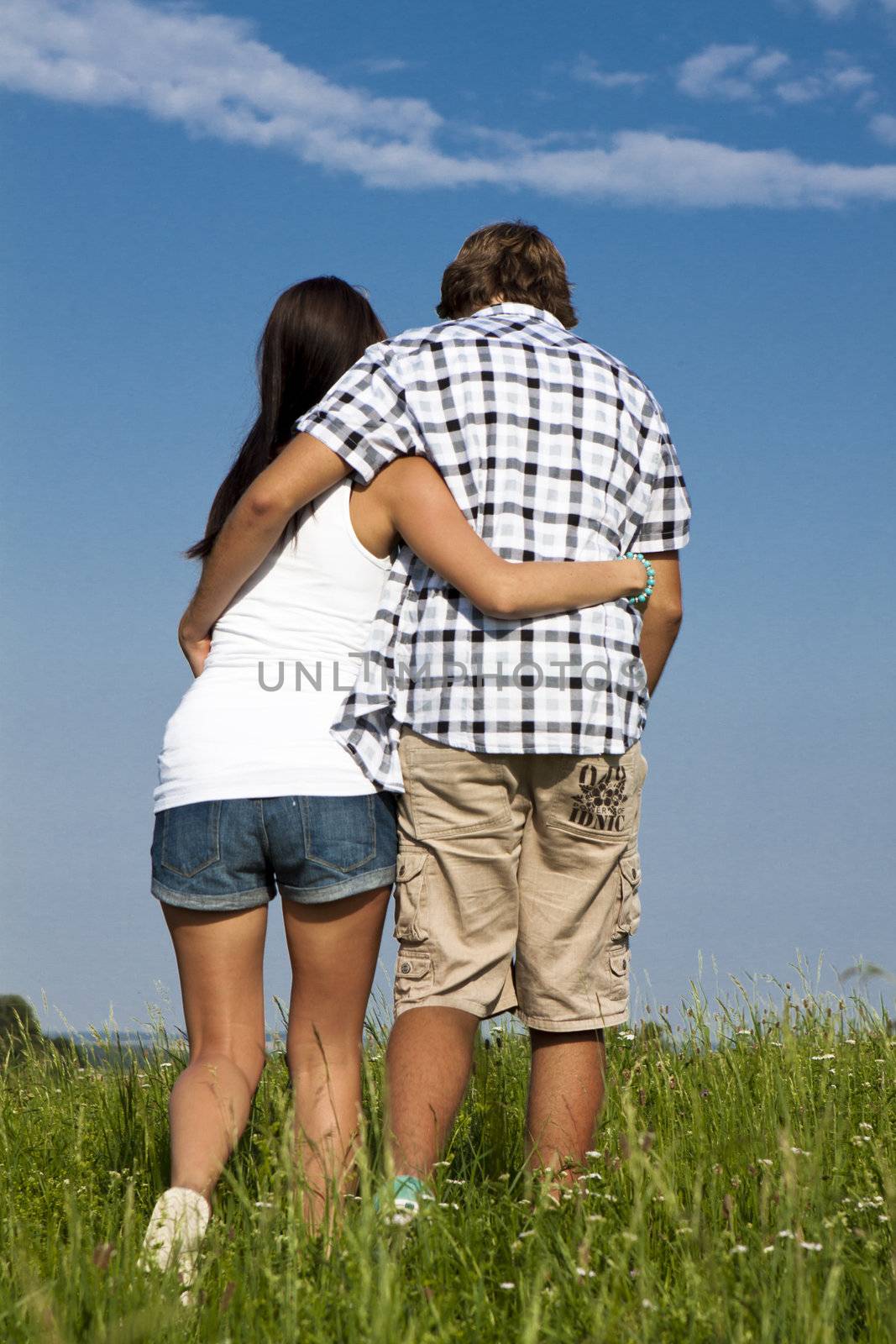 young love couple smiling outdoor in summer having fun