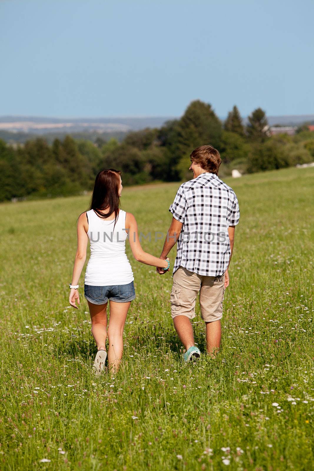 young love couple smiling outdoor in summer having fun