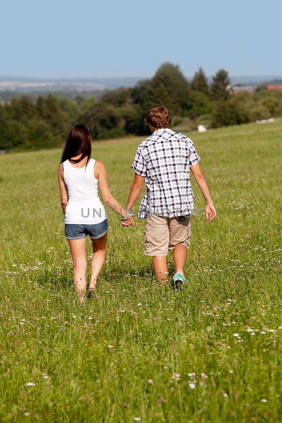 young love couple smiling outdoor in summer having fun