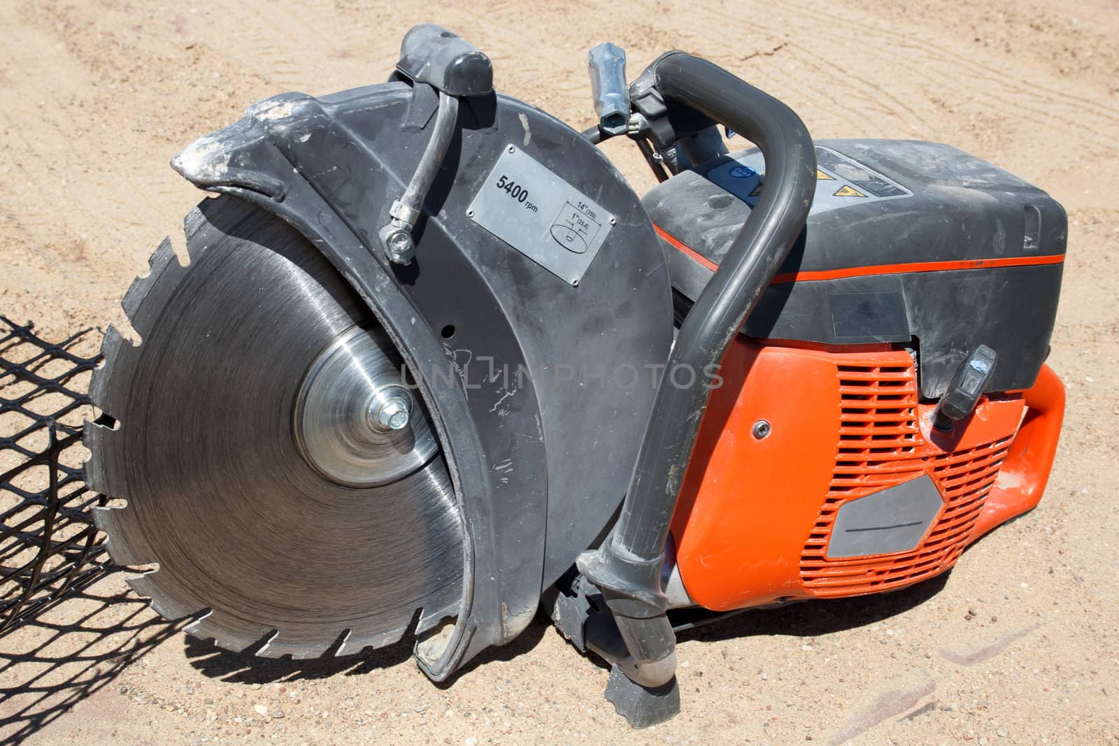 mechanical gasoline engine concrete block saw in constructions site