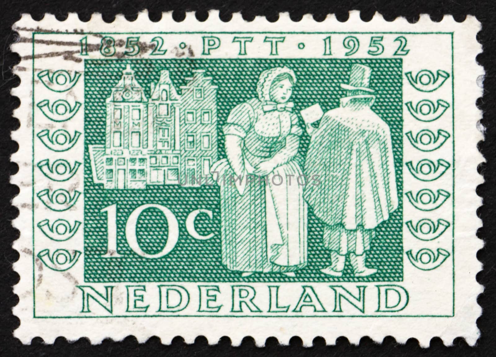 NETHERLANDS - CIRCA 1952: a stamp printed in the Netherlands shows Mail Delivery 1852,  Centenary of Dutch Postage Stamps, circa 1952