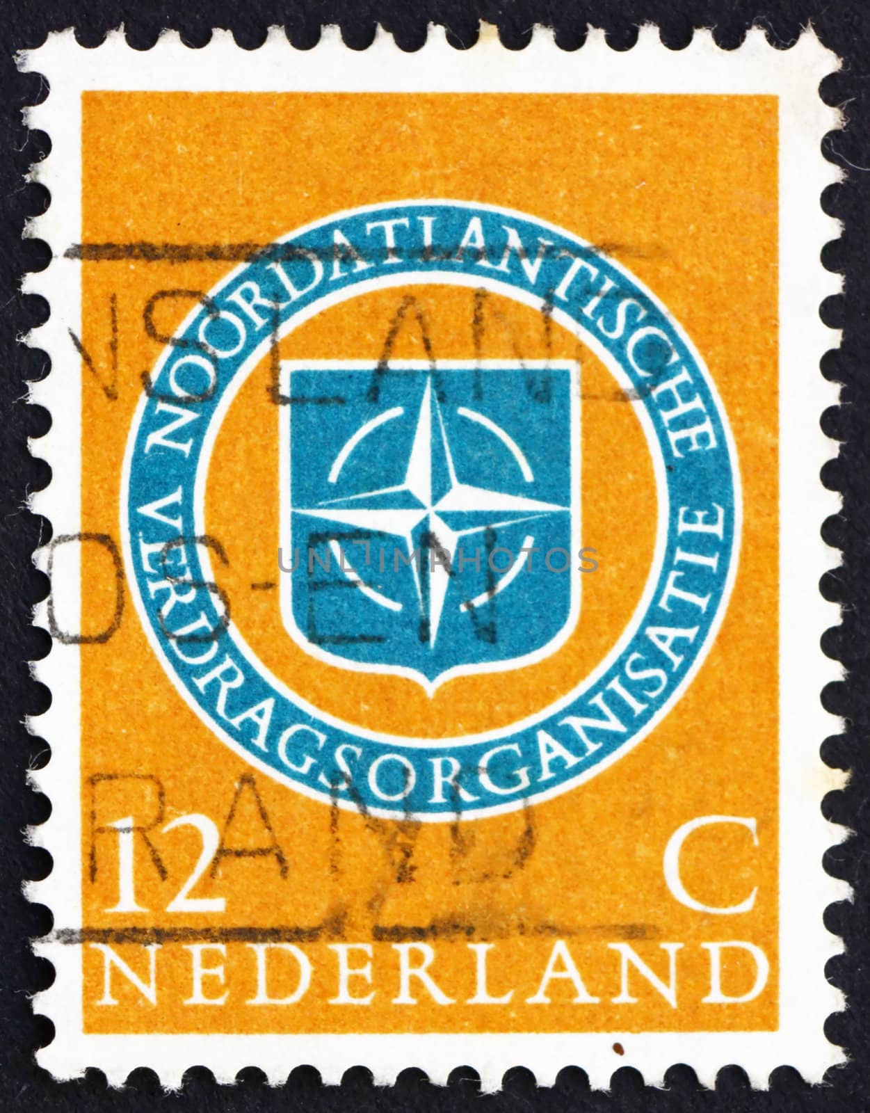 NETHERLANDS - CIRCA 1959: a stamp printed in the Netherlands shows NATO Emblem, 10th Anniversary of NATO, circa 1959