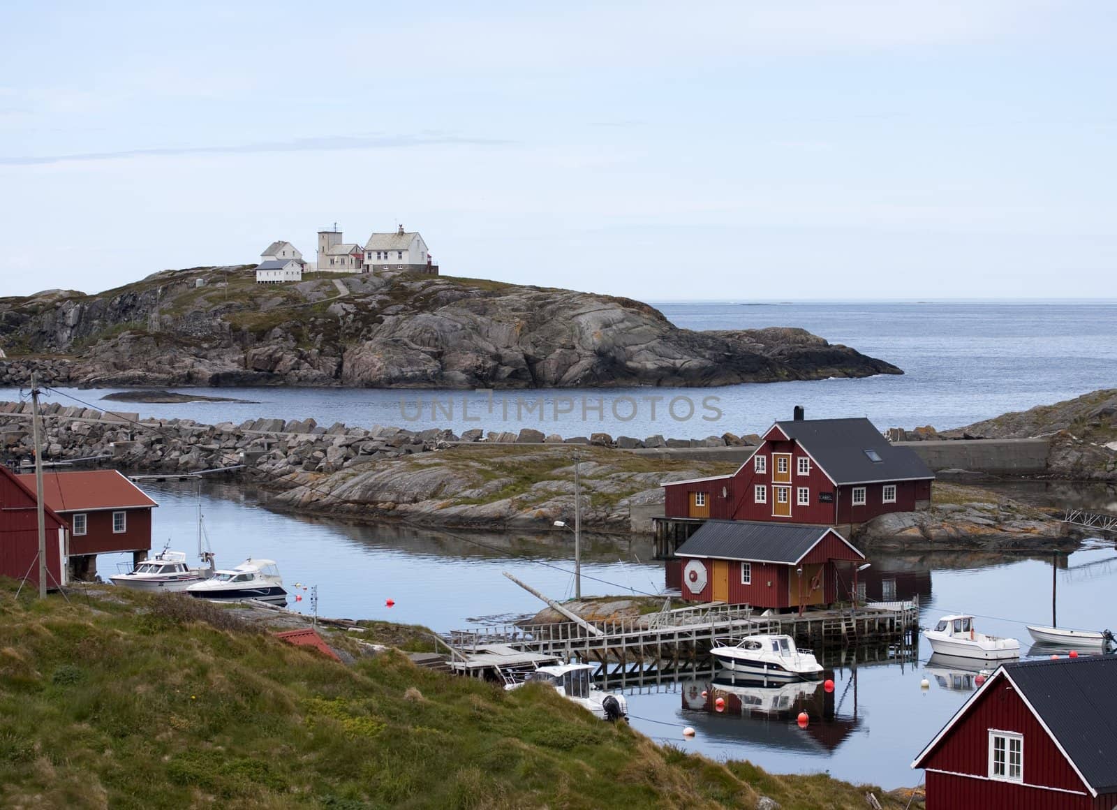 Norwegian rorbu fishing houses and boats on Bjornsund