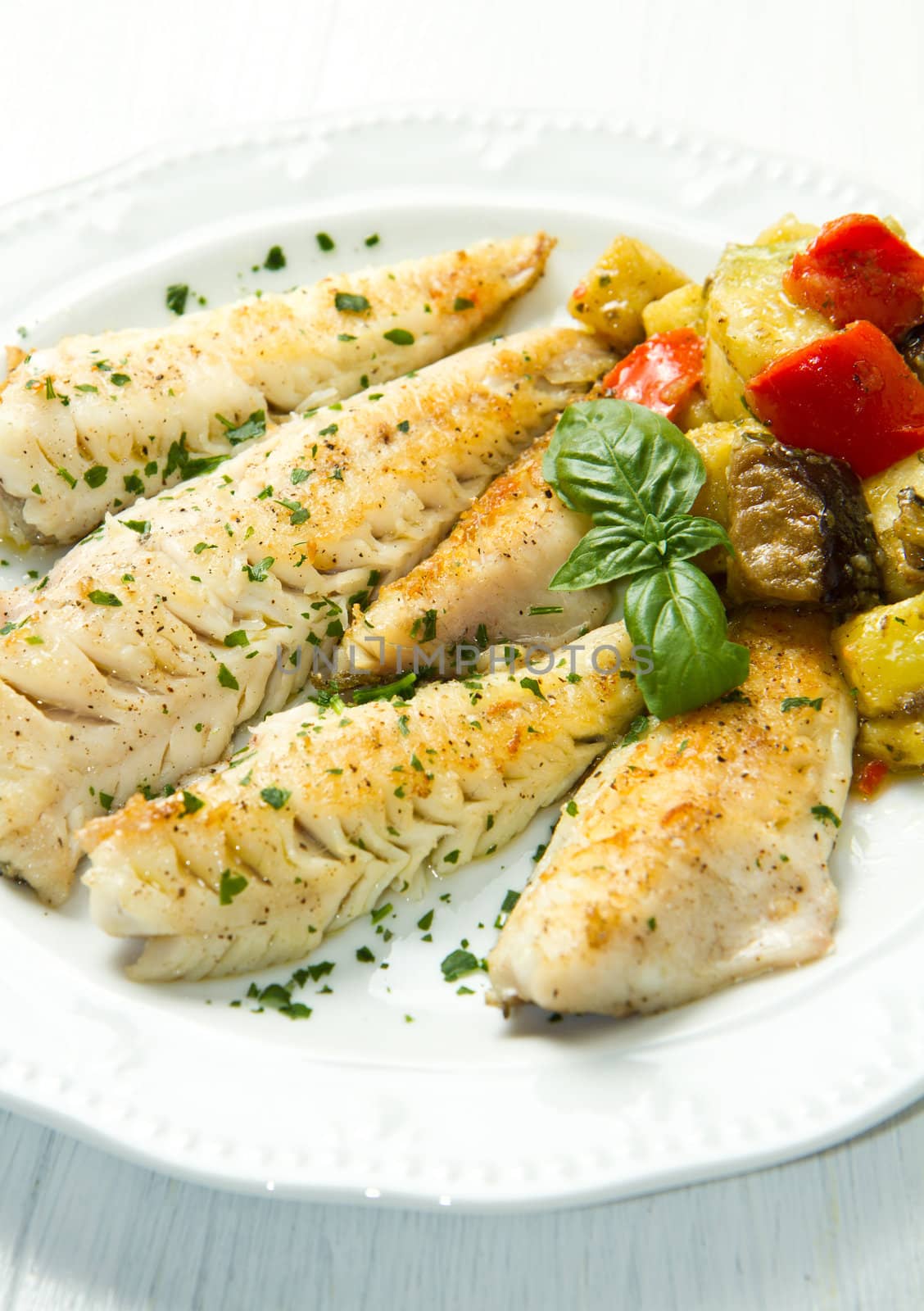 Tasty healthy fish fillet with vegetables