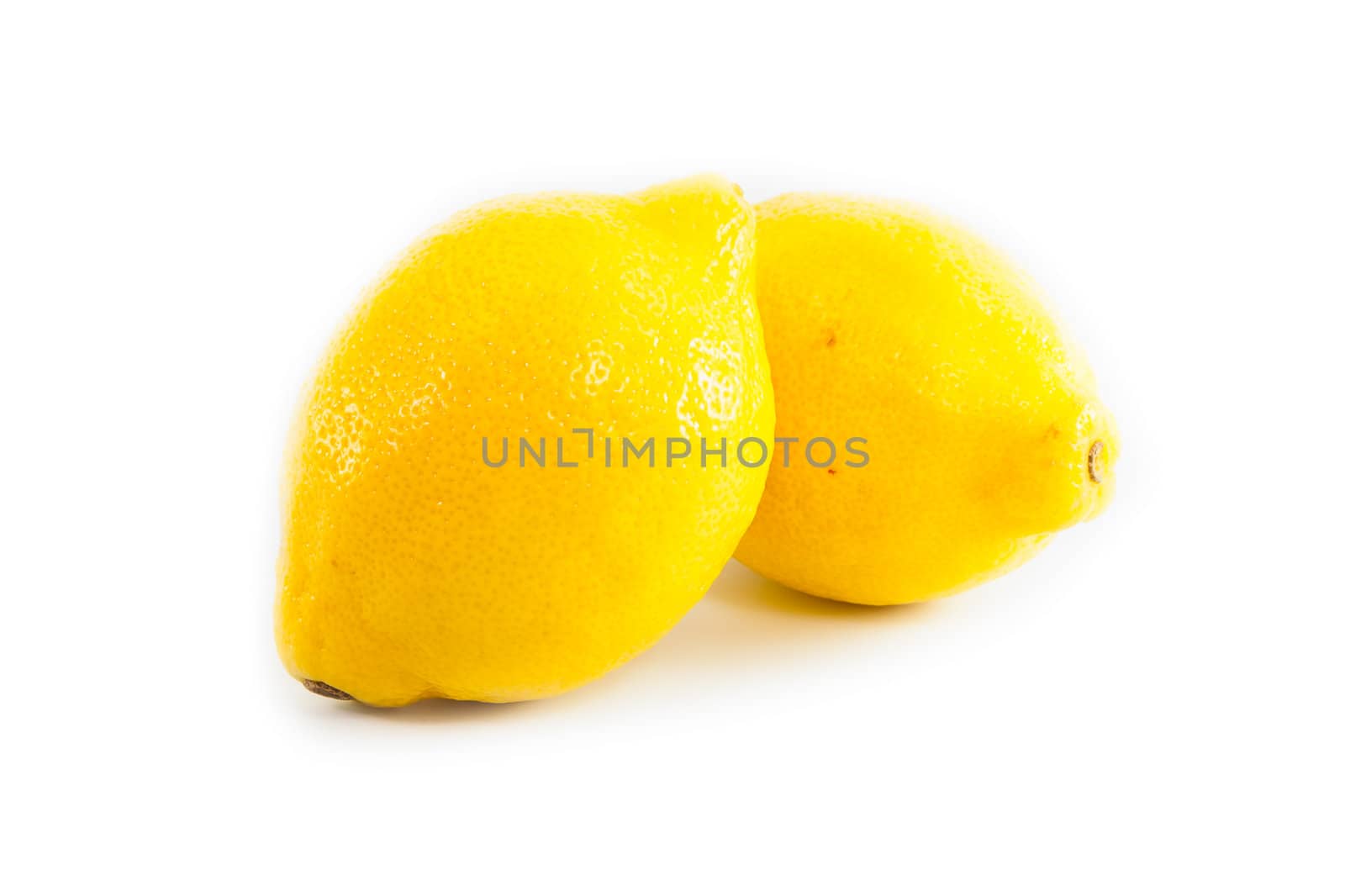 Yellow lemon on white background by moggara12