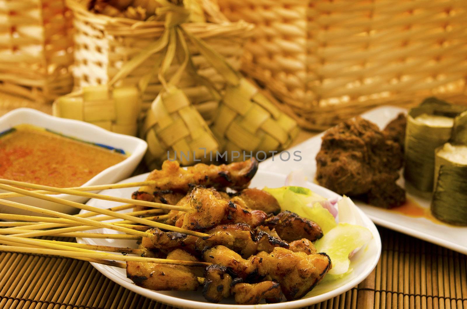 Asian malay Ramadhan foods, satay chicken, rendang, lemang and ketupat