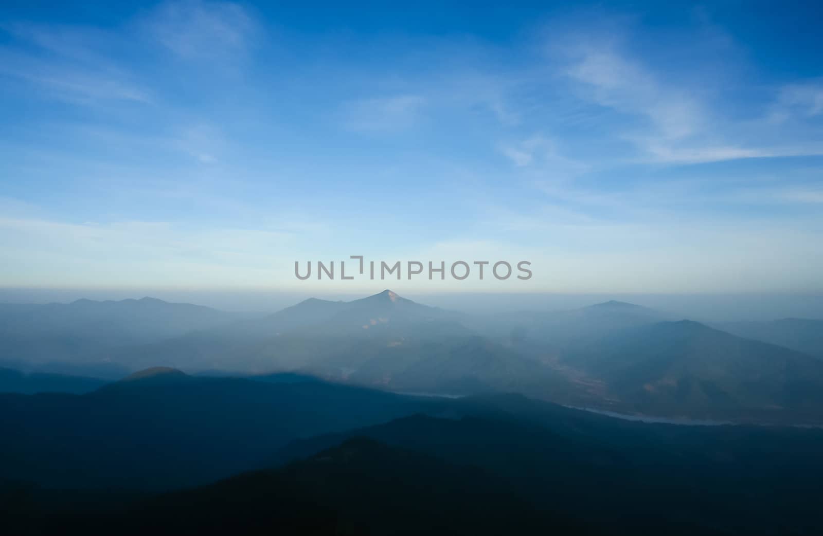 misty early on mountain landscape blue sky cloudy