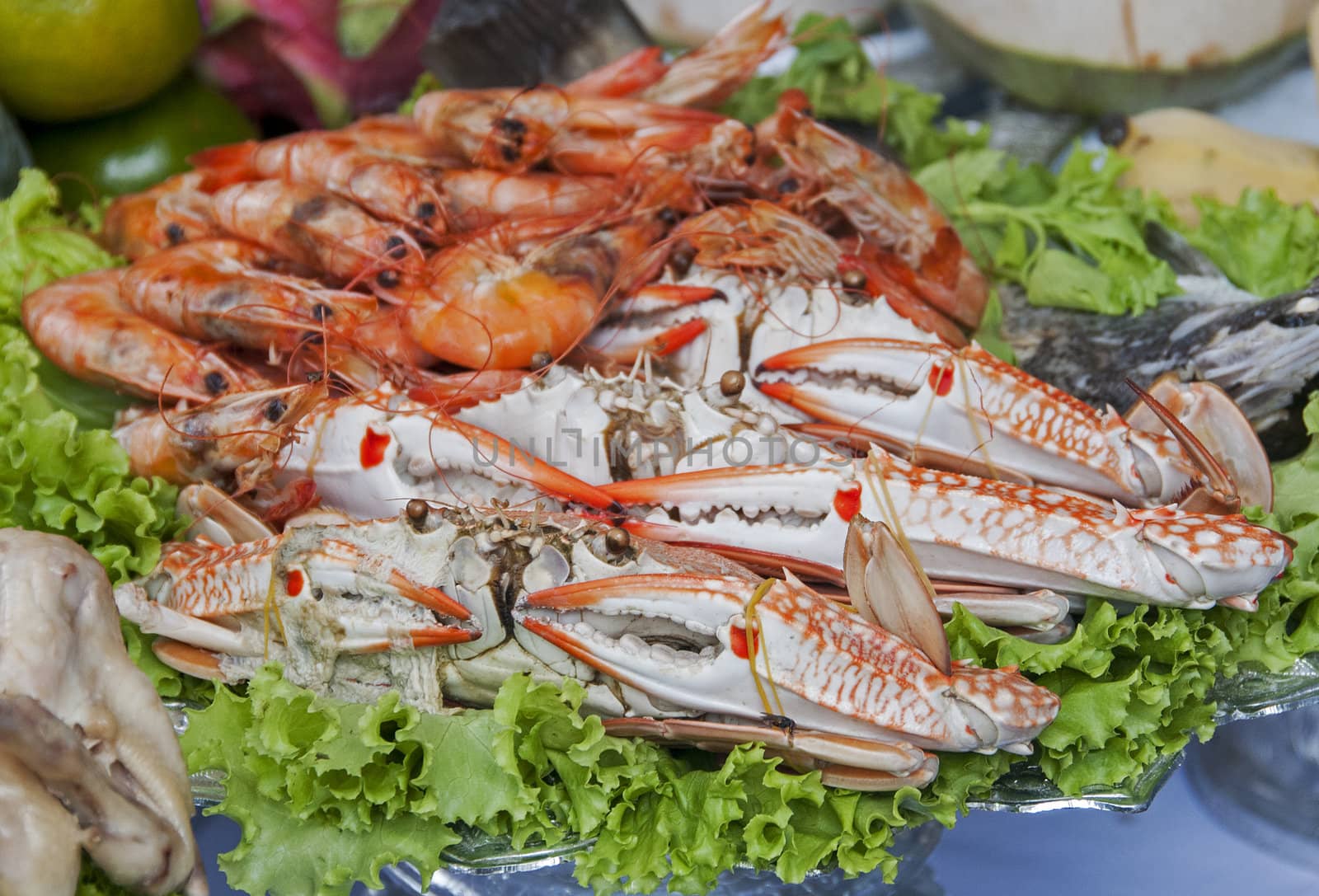 plate with asian seafood shrimps and crab