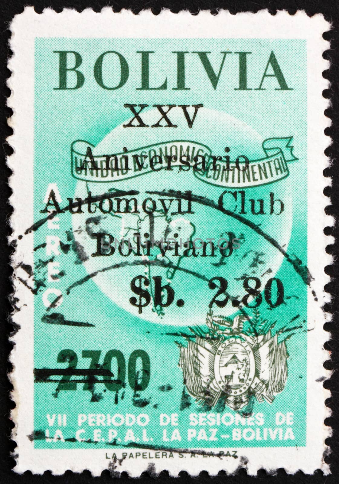 BOLIVIA - CIRCA 1966: a stamp printed in the Bolivia shows Map of South America and La Paz Arms, circa 1966