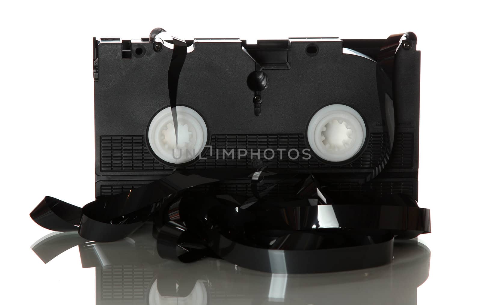 damaged videotape on white background by pterwort