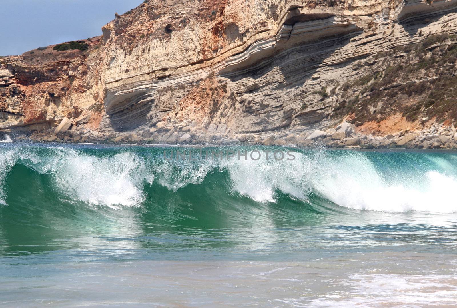 Ocean big waves and big rock
