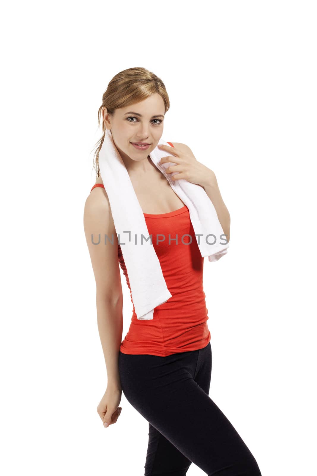 young smiling fitness woman with a white towel on white background