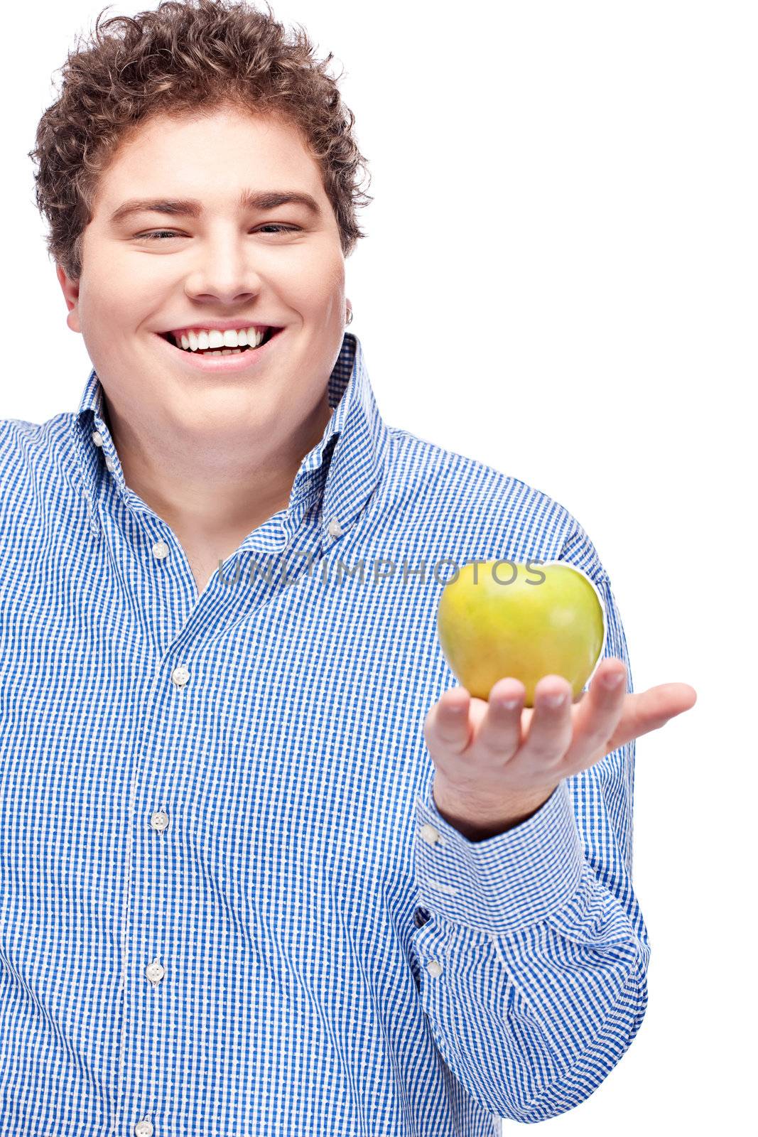Happy chubby man holding apple, isolated on white