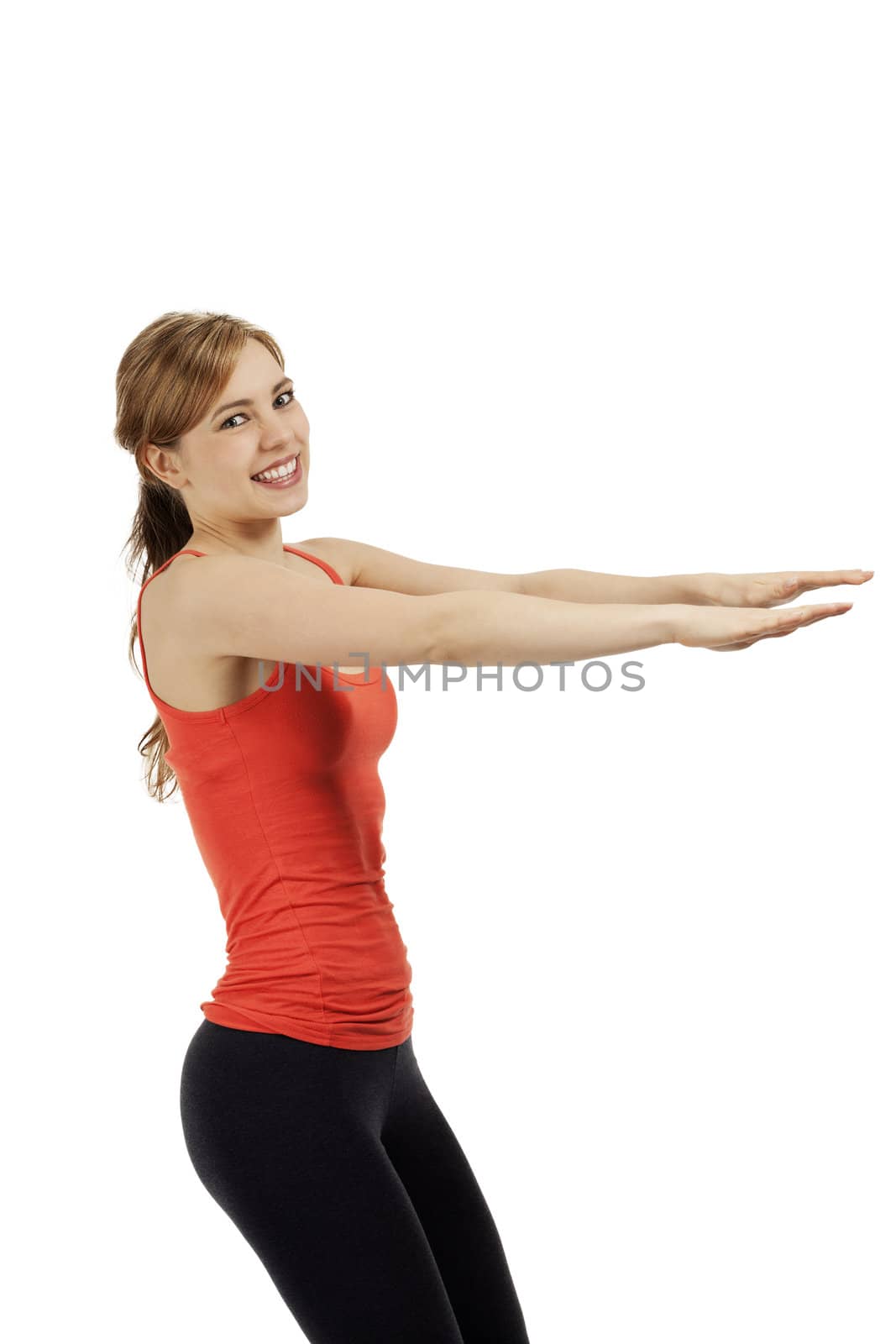 young happy fitness woman exercising with her arms on white background