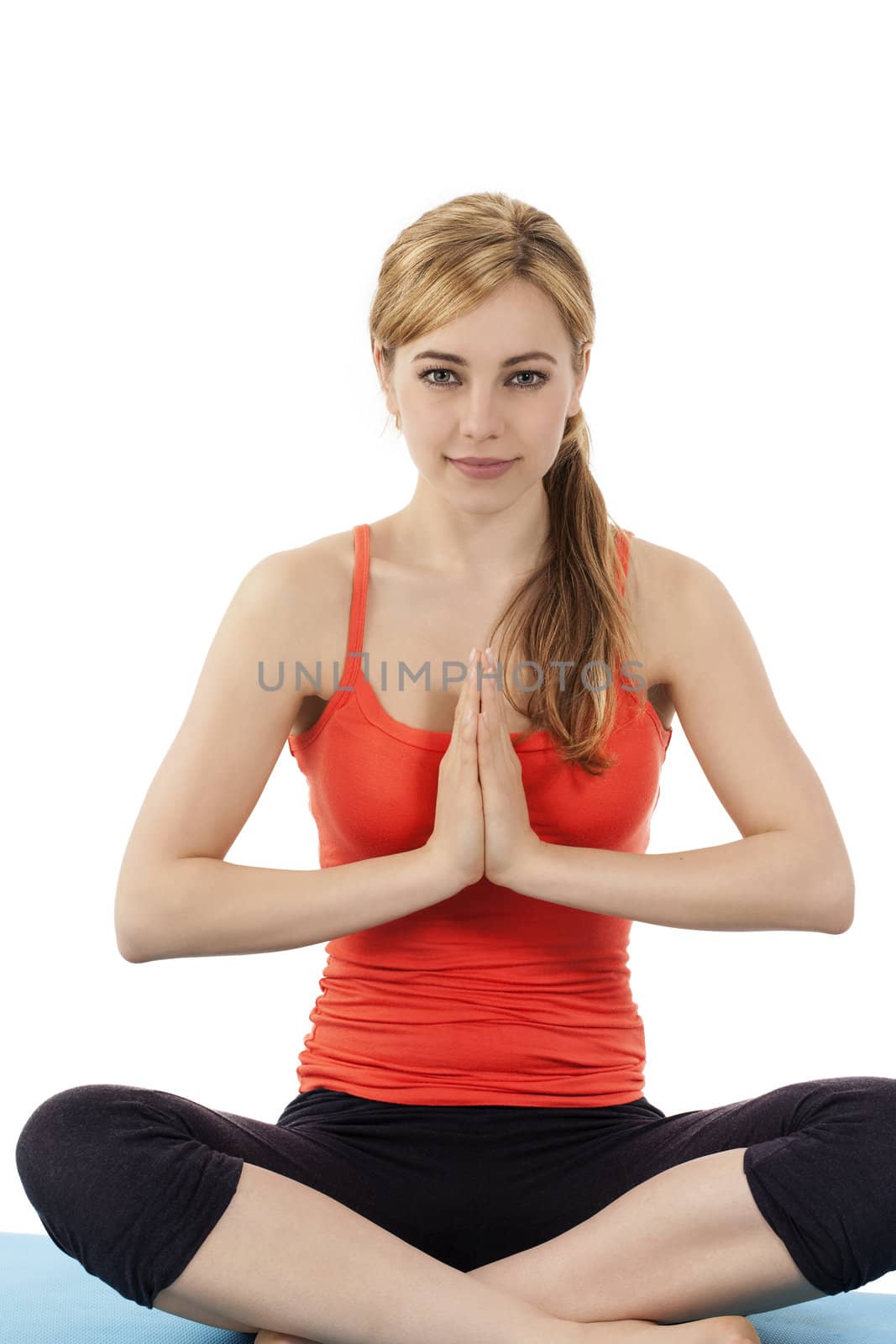 young beautiful fitness woman exercising yoga on white background