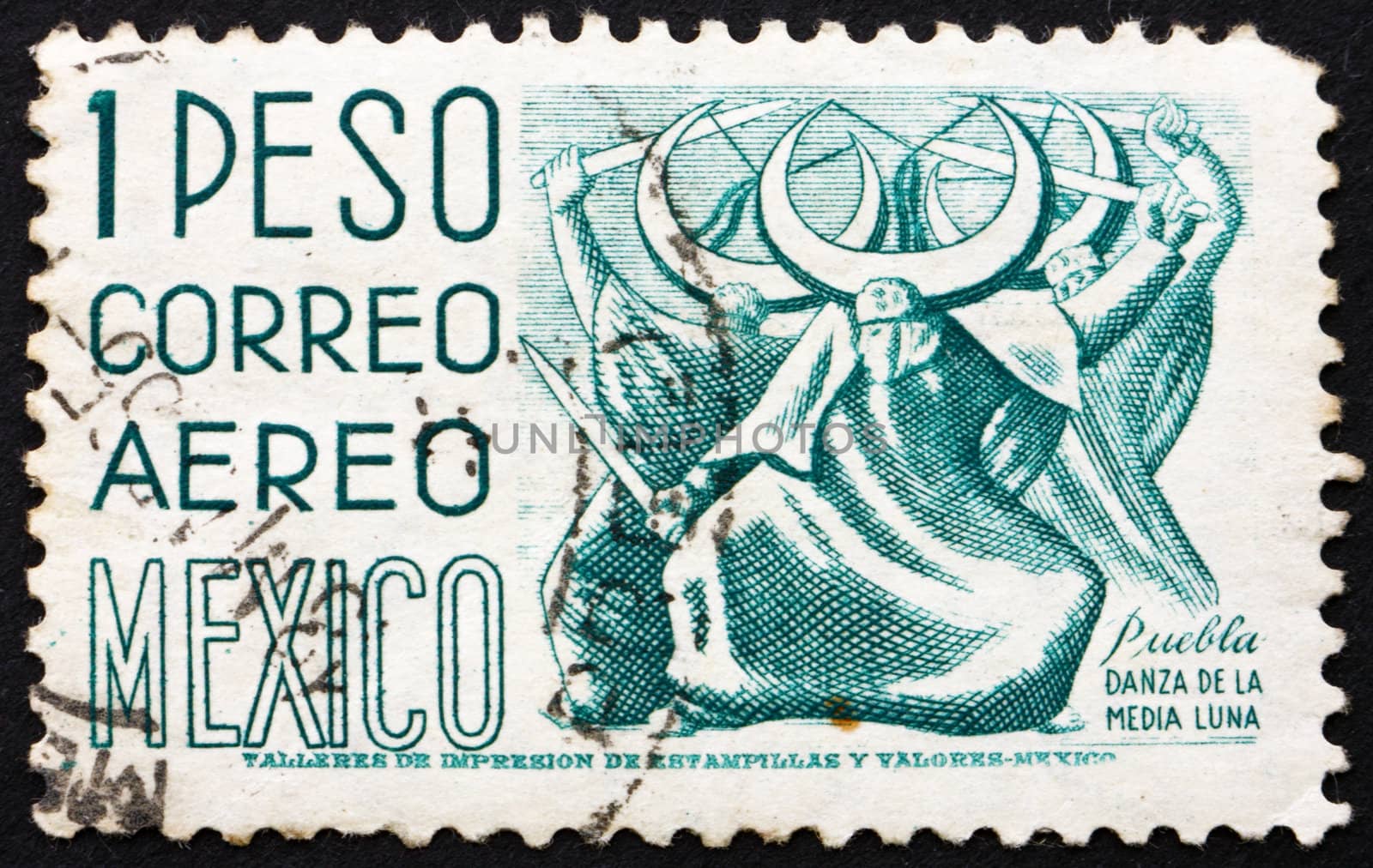 MEXICO - CIRCA 1950: a stamp printed in the Mexico shows Puebla, Dance of the Half Moon, circa 1950