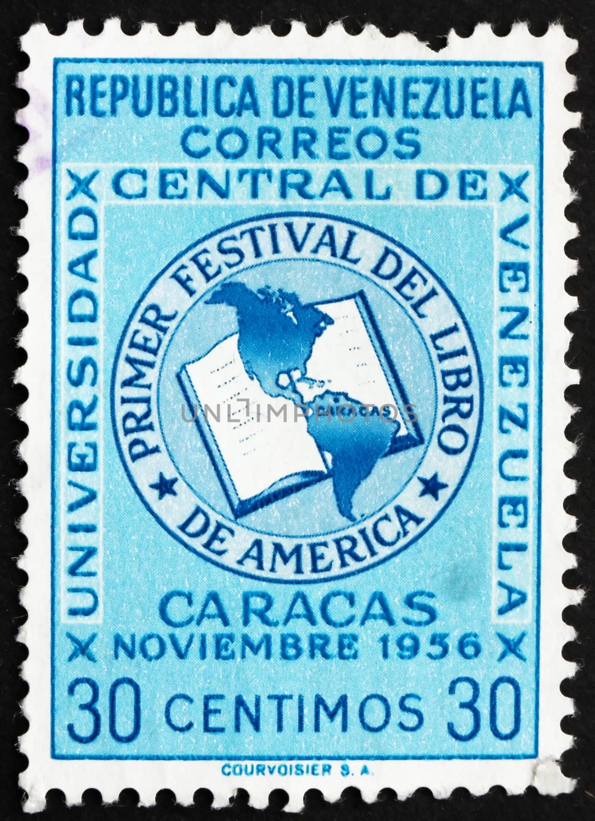 VENEZUELA - CIRCA 1956: a stamp printed in the Venezuela shows Book and Map of the Americas, Book Festival of the Americas, circa 1956