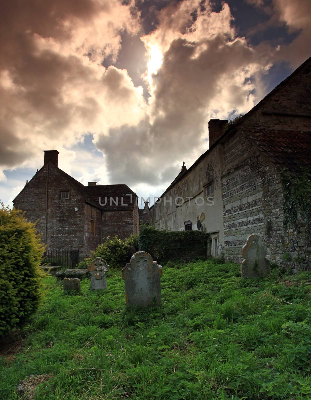 Old architecture and graveyard in cerne abbas dorset
