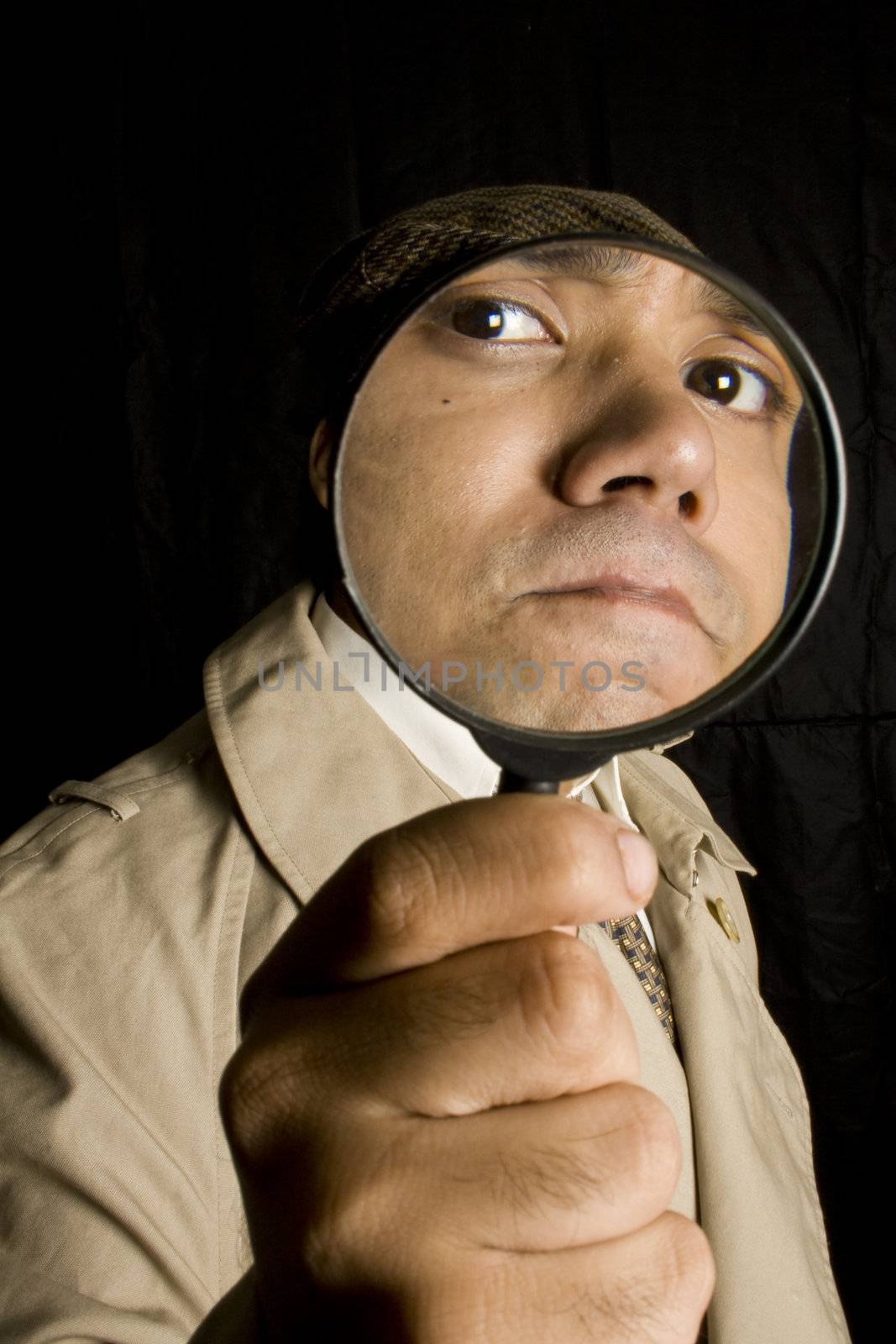 Detective looking through eye glass