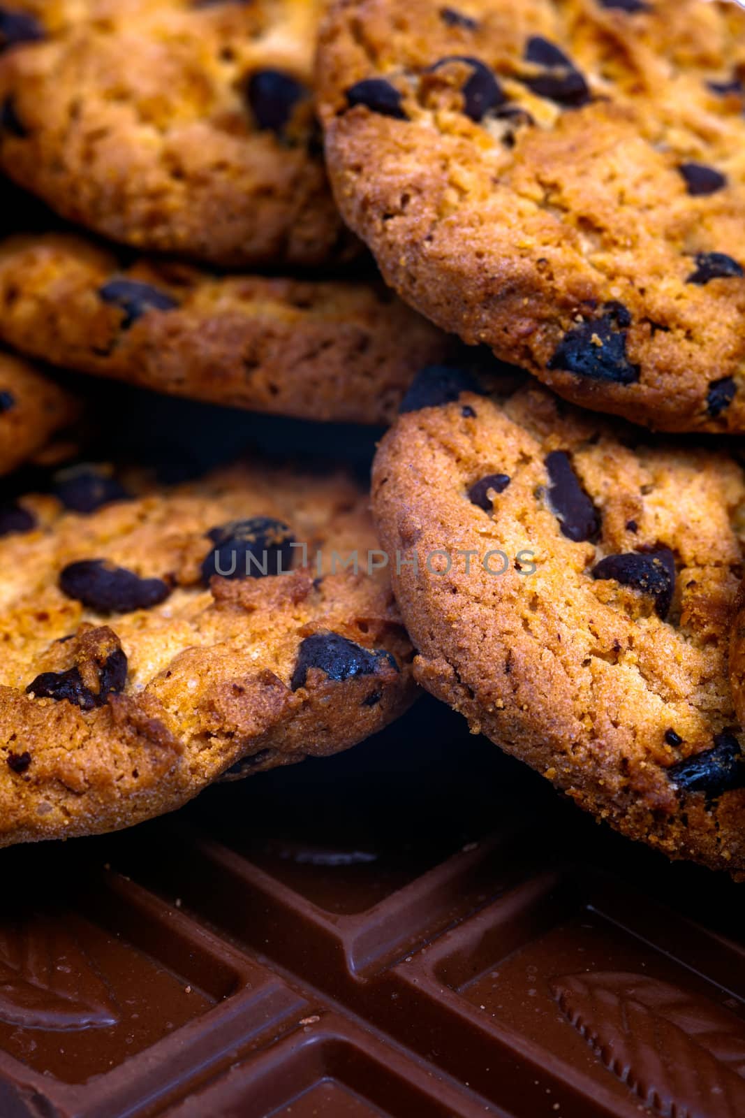 A composition of chocolate bars and cookies ready to eat