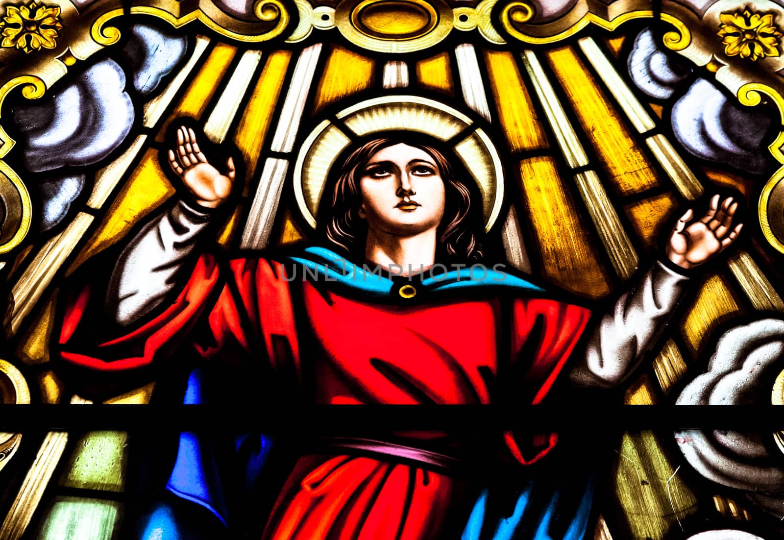Wonderful ancient stained glass window formed of multiple colors of the Church of Santa  Cruz, Cadiz, Spain