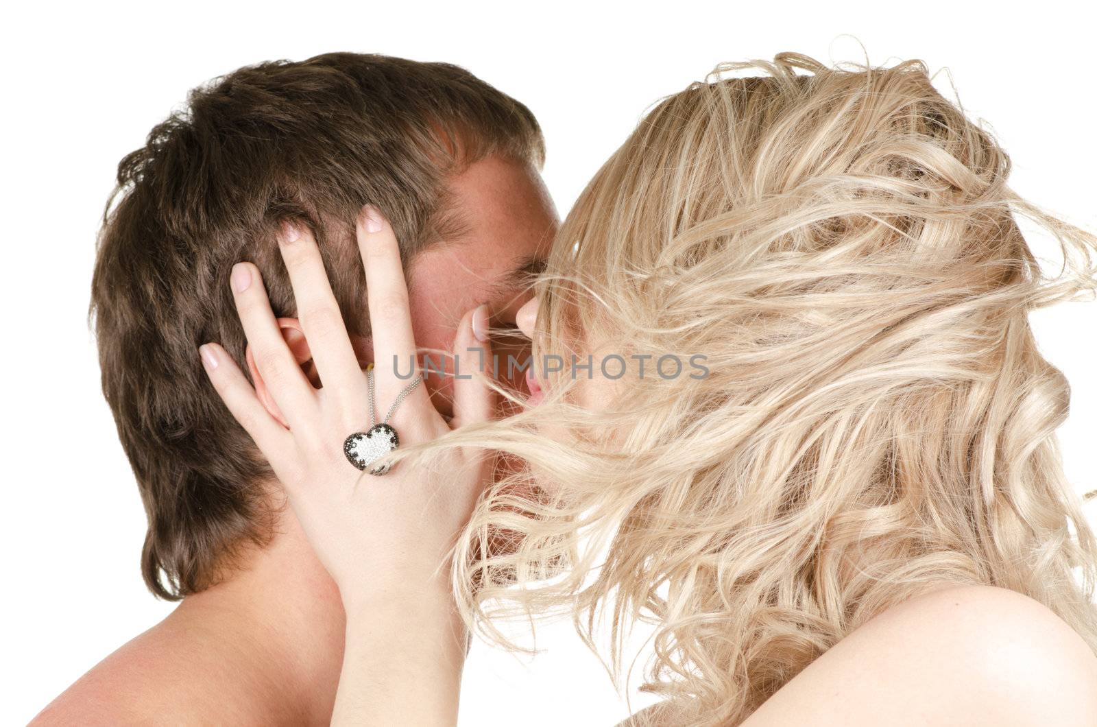 Kissing man and woman - lovers closeup portraits