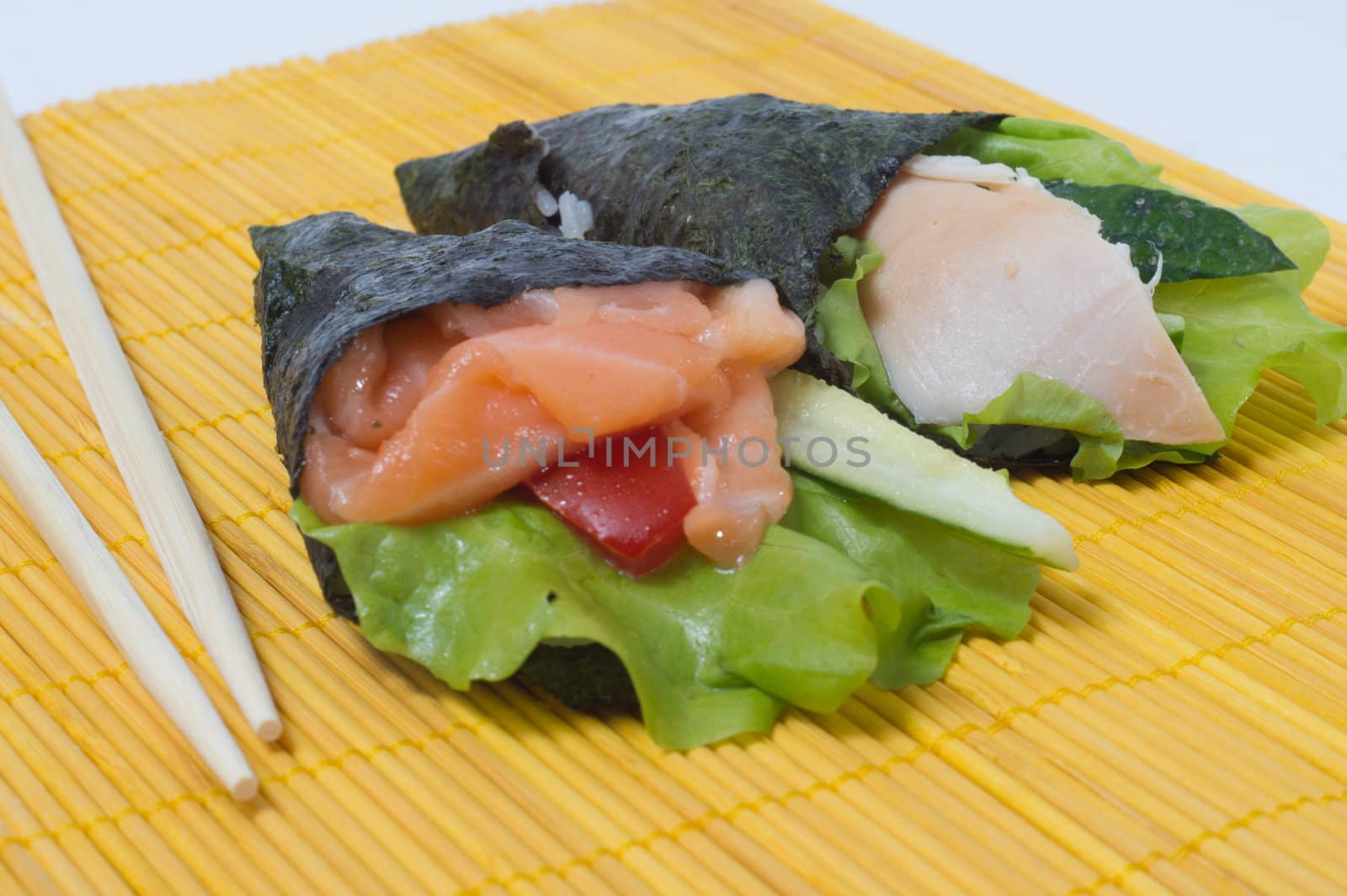 Various kinds of sushi and sashimi. Isolated.