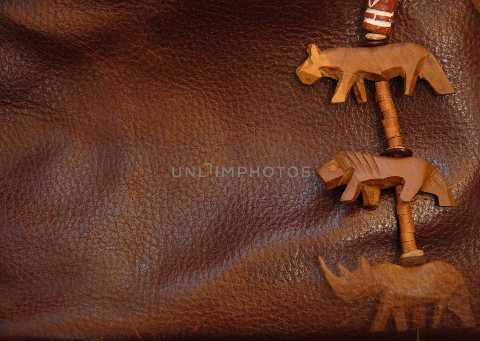 Leather background with African ornaments by Carche