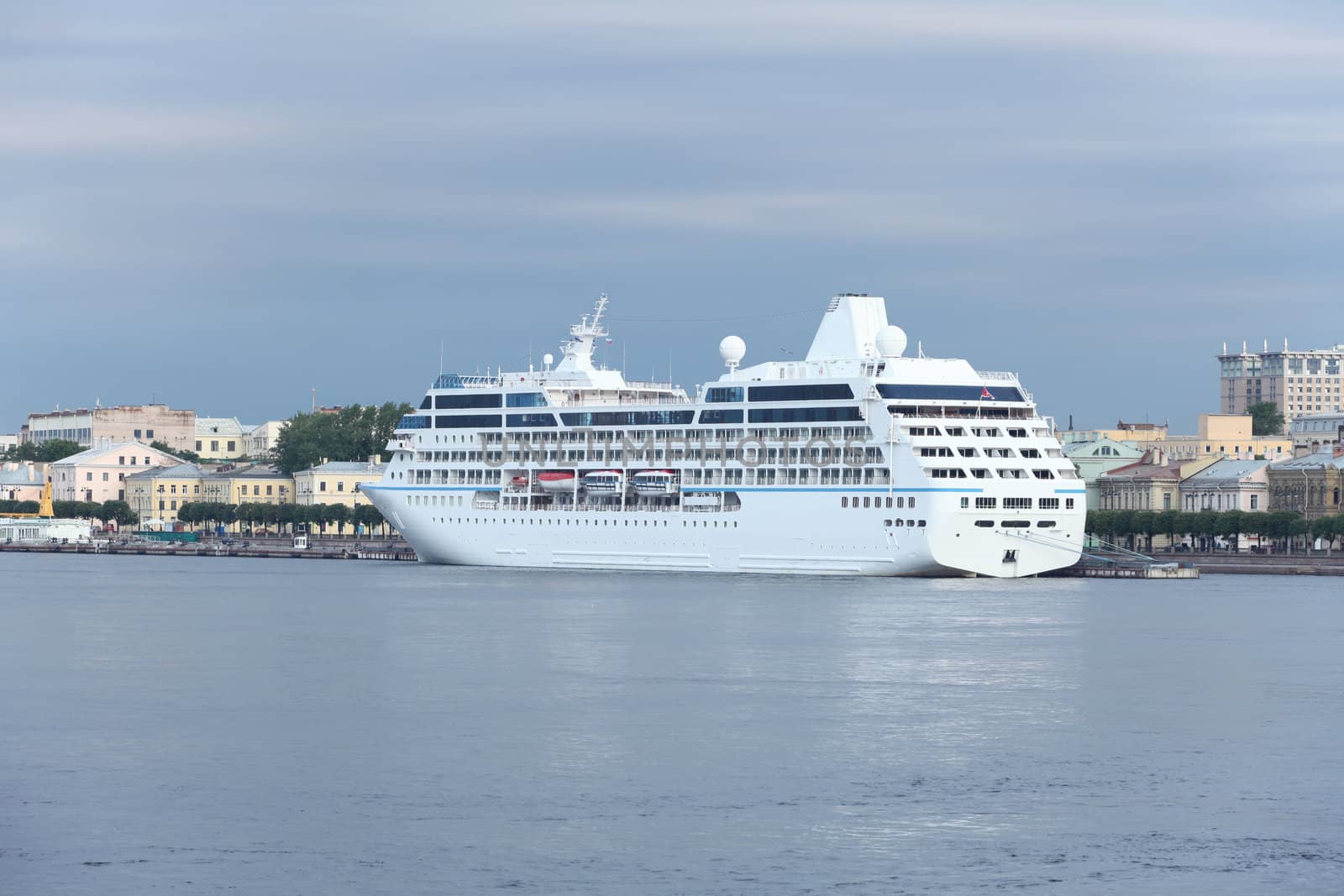 cruise ship at the pier in the city