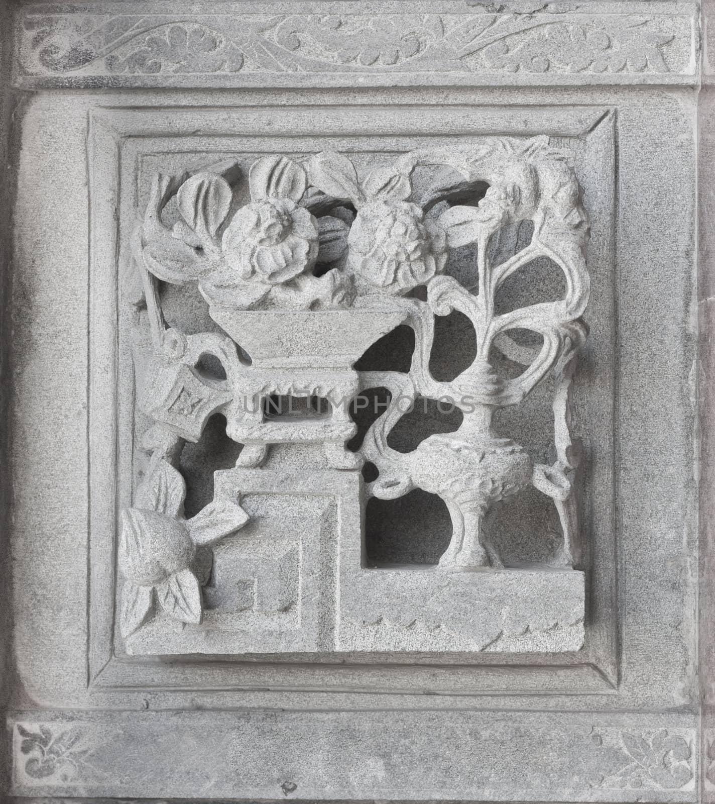 stone carving, the carving is a beautiful taiwan art style.