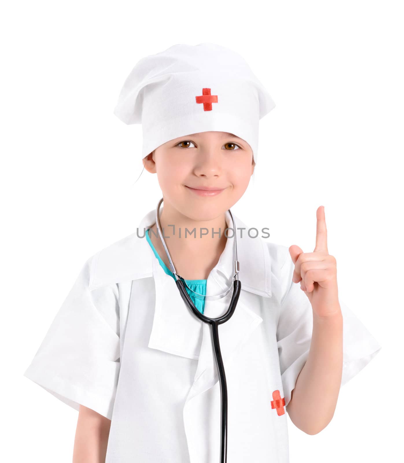 Portrait of a smiling little girl wearing as a doctor on white uniform, with a stethoscope, while pointing finger up and gives instructions. Isolated on white background.