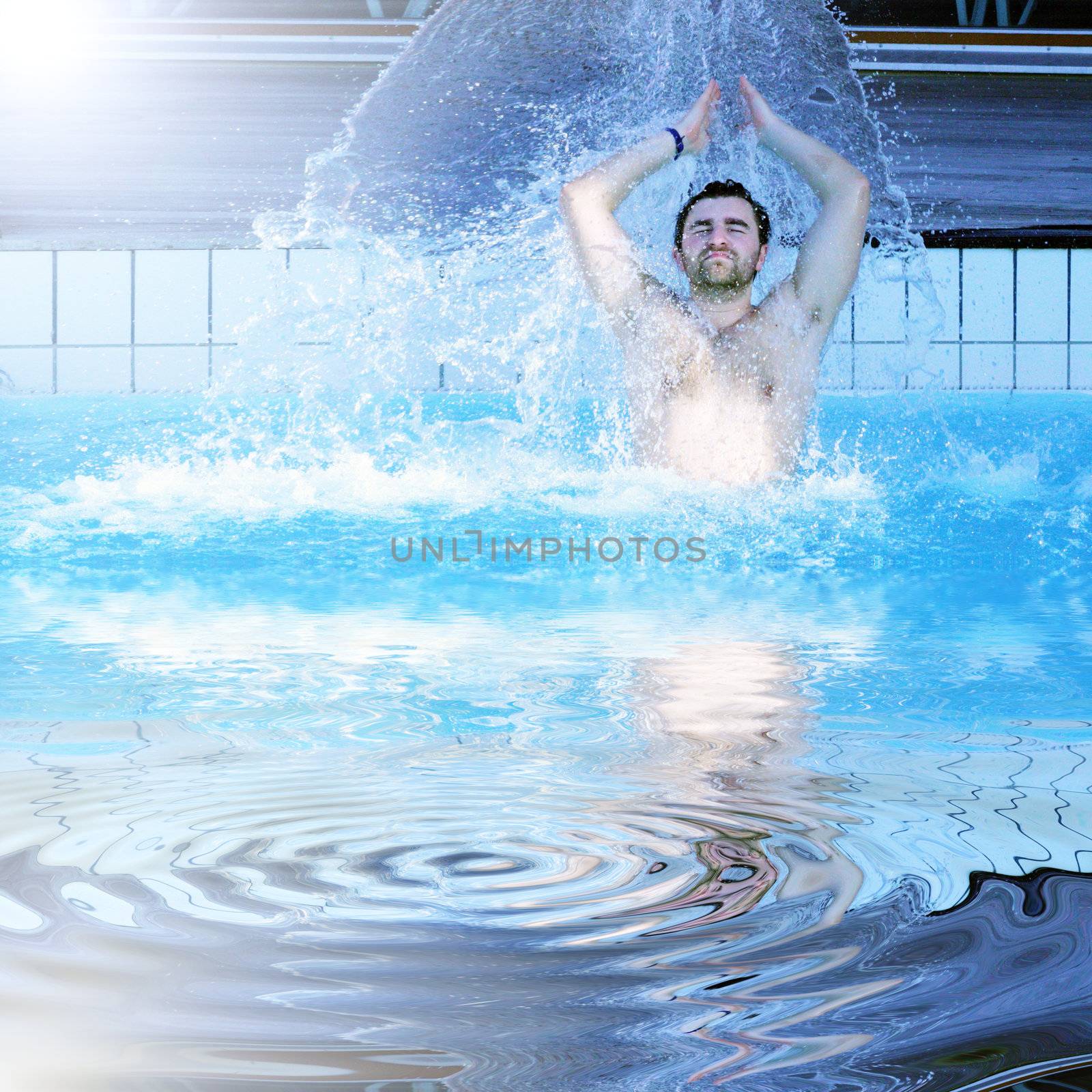 young attractive man relax in spa area