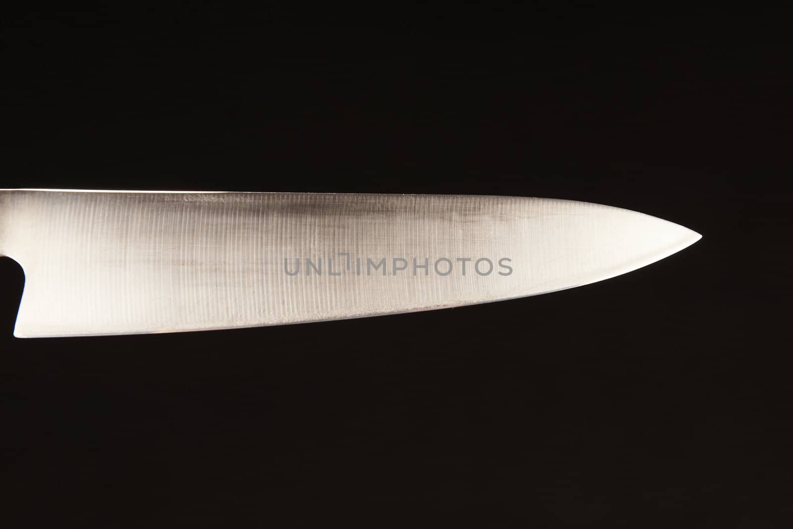 Blade of carving knife - on black background