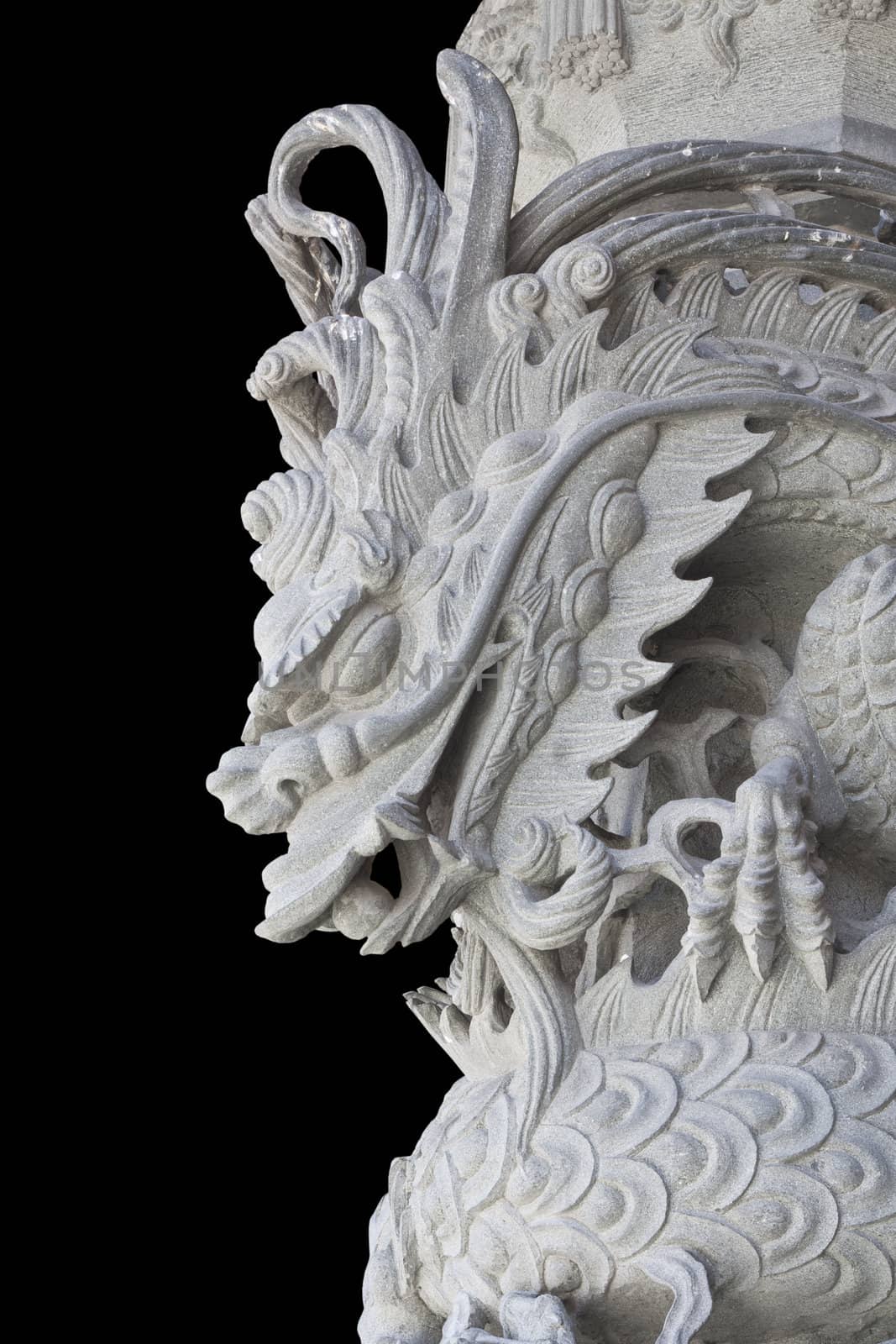 stone carving, the carving is a beautiful dragon.