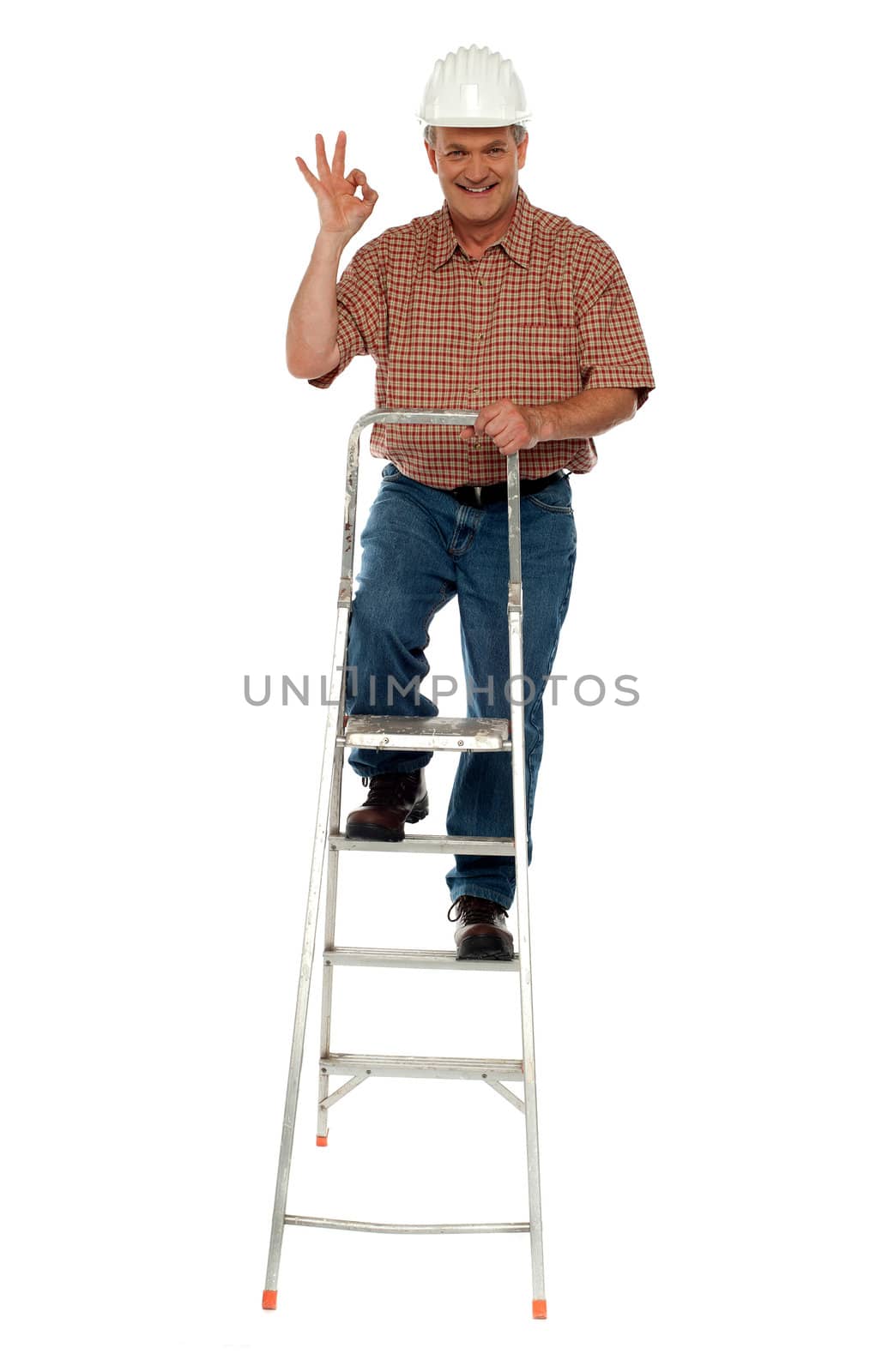 Contraction worker with excellent gesture climbing on ladder, full length portrait