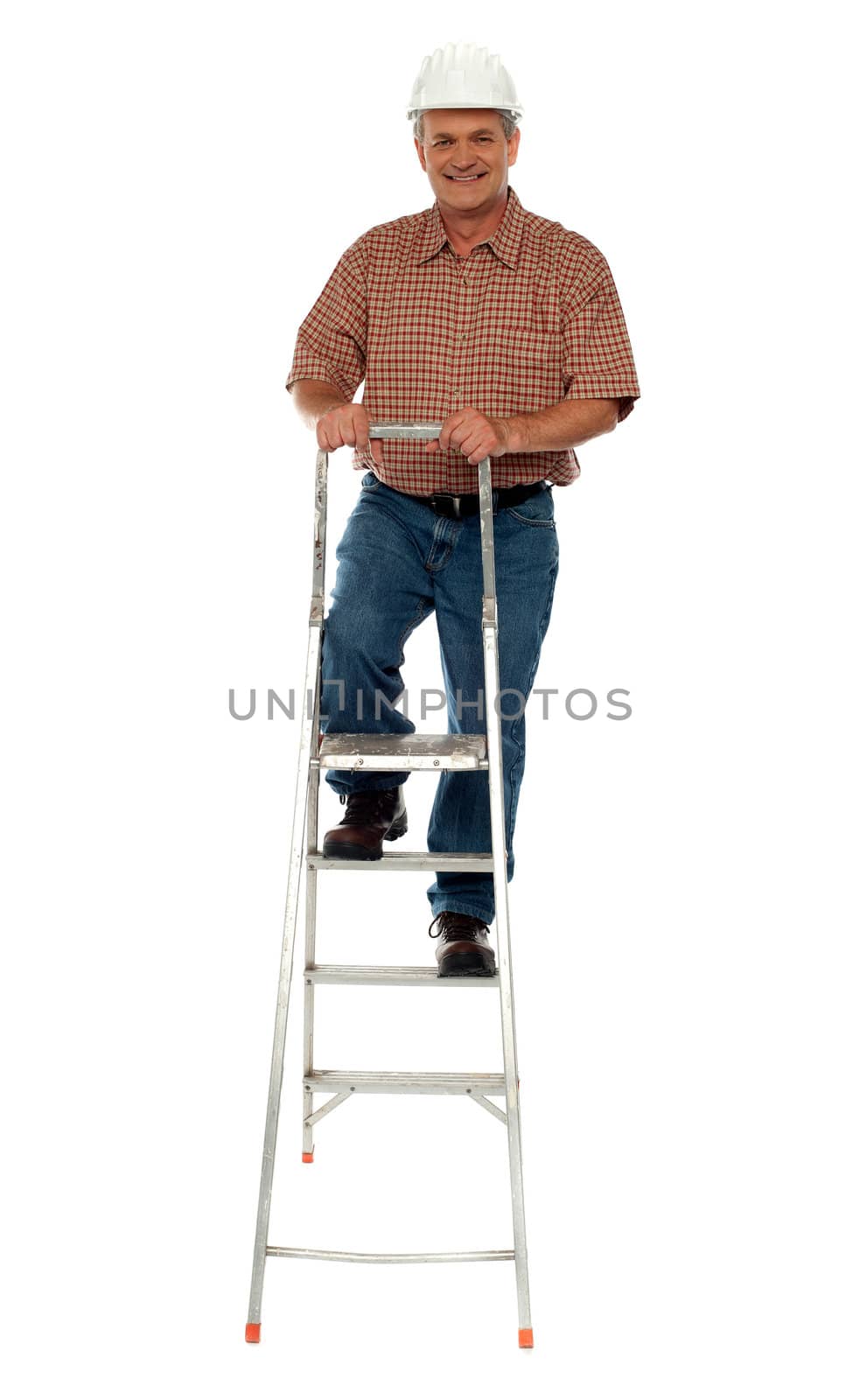 Worker wearing hard hat climbing ladder. All on white background