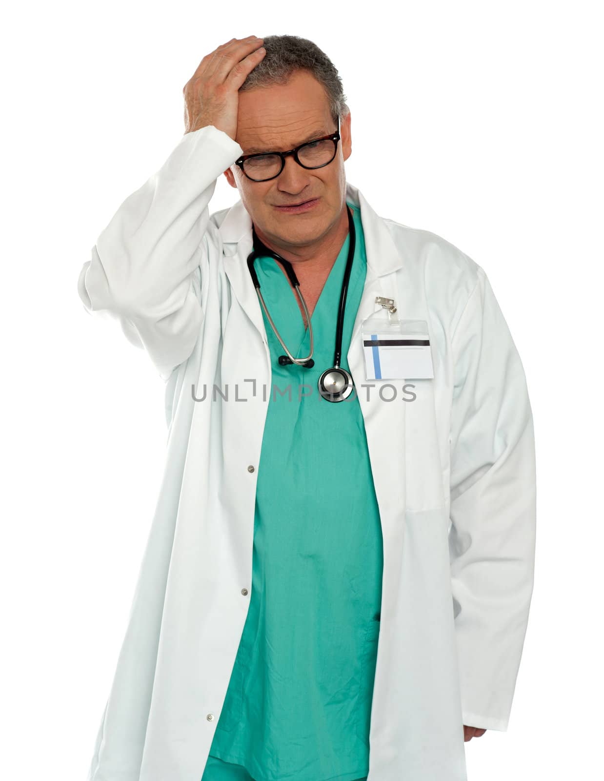 Senior physician having headache. Holding his head