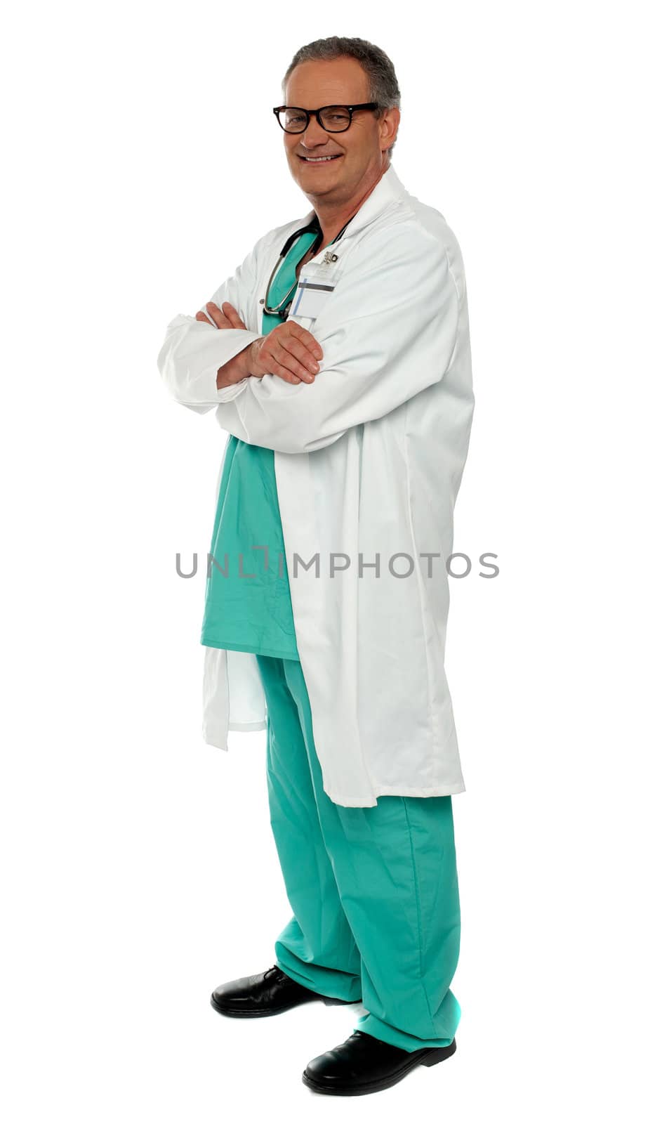 Side view portrait of casual male physician posing with arms crossed