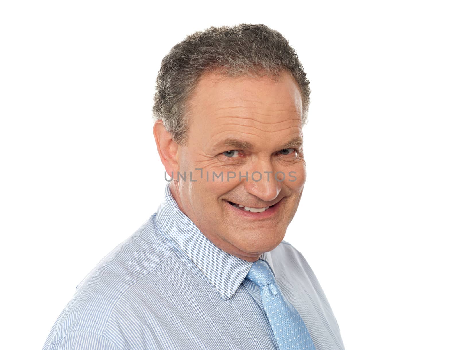 Closeup portrait of smiling senior male executive isolated over white background