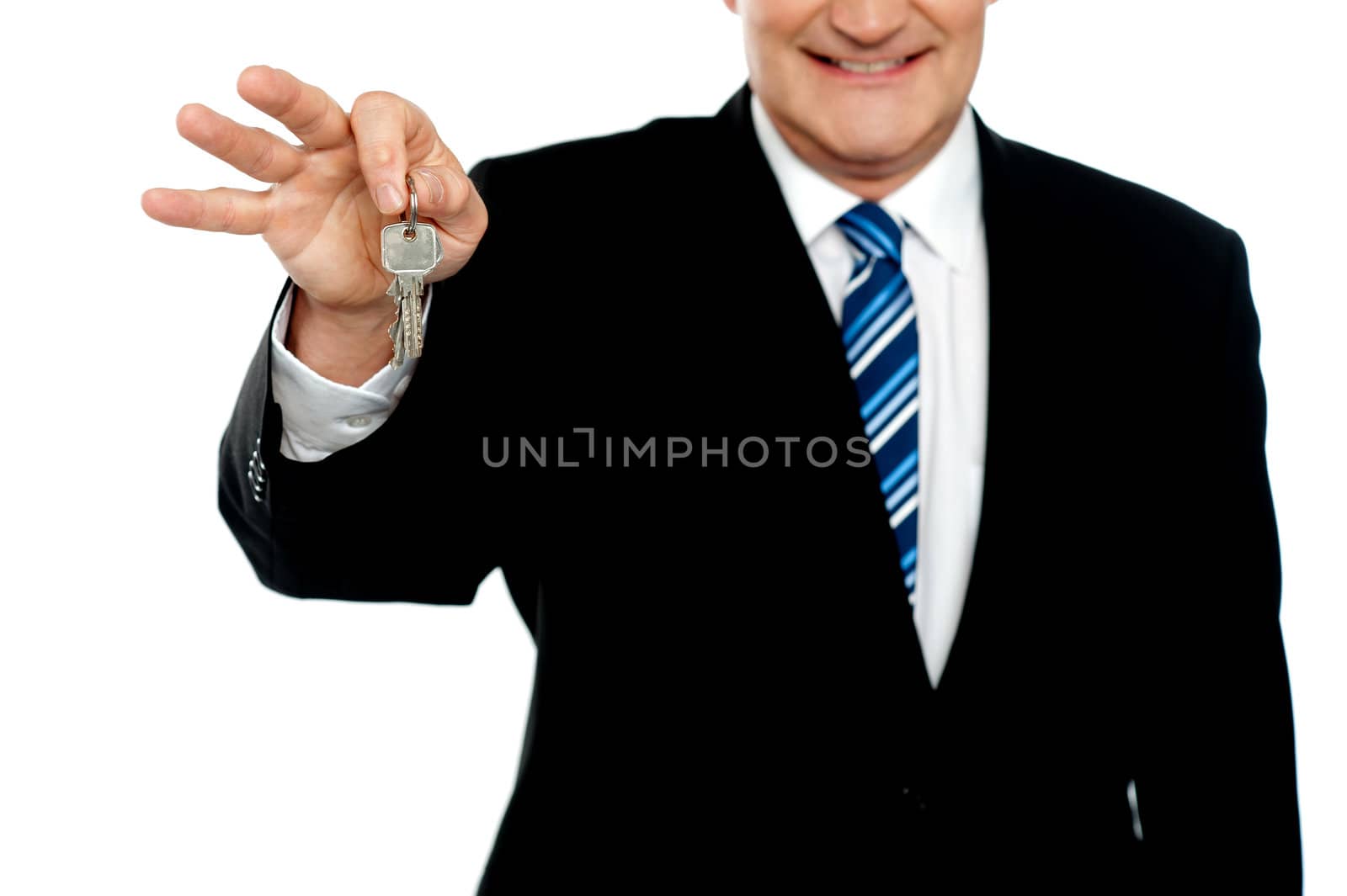 Cropped image of businessman holding keys isolated over white background